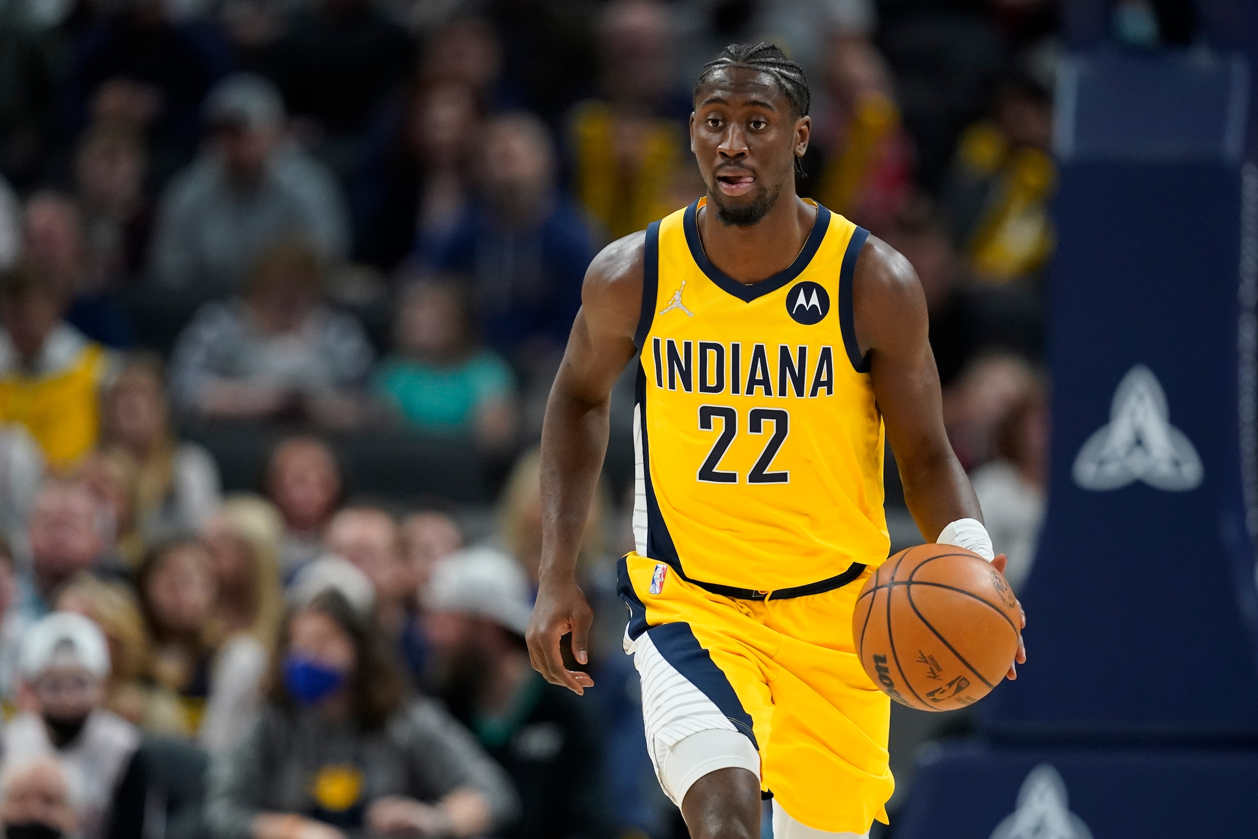 Indiana Pacers' Caris LeVert dribbles during the first half of an NBA basketball game against the Chicago Bulls, Friday, Dec. 31, 2021, in Indianapolis. (AP Photo/Darron Cummings)