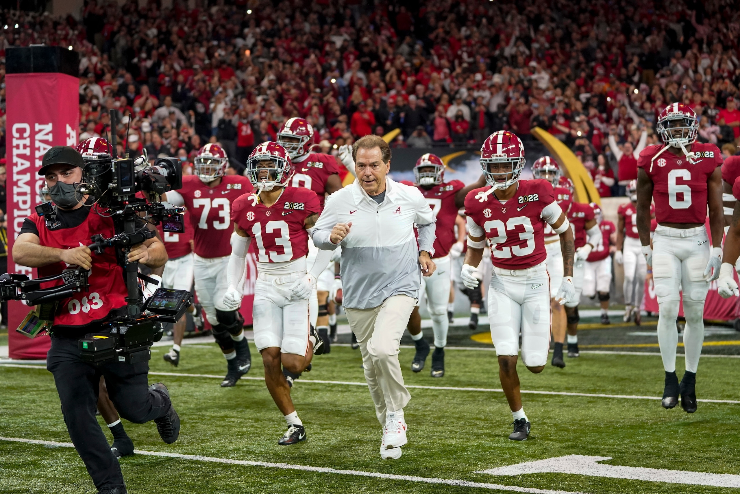 Alabama head coach Nick Saban leads his team on the field before the College Football Playoff championship football game against Georgia Monday, Jan. 10, 2022, in Indianapolis. (AP Photo/Paul Sancya) Alabama head coach Nick Saban leads his team on the field before the College Football Playoff championship football game against Georgia Monday, Jan. 10, 2022, in Indianapolis. (AP Photo/Paul Sancya)
