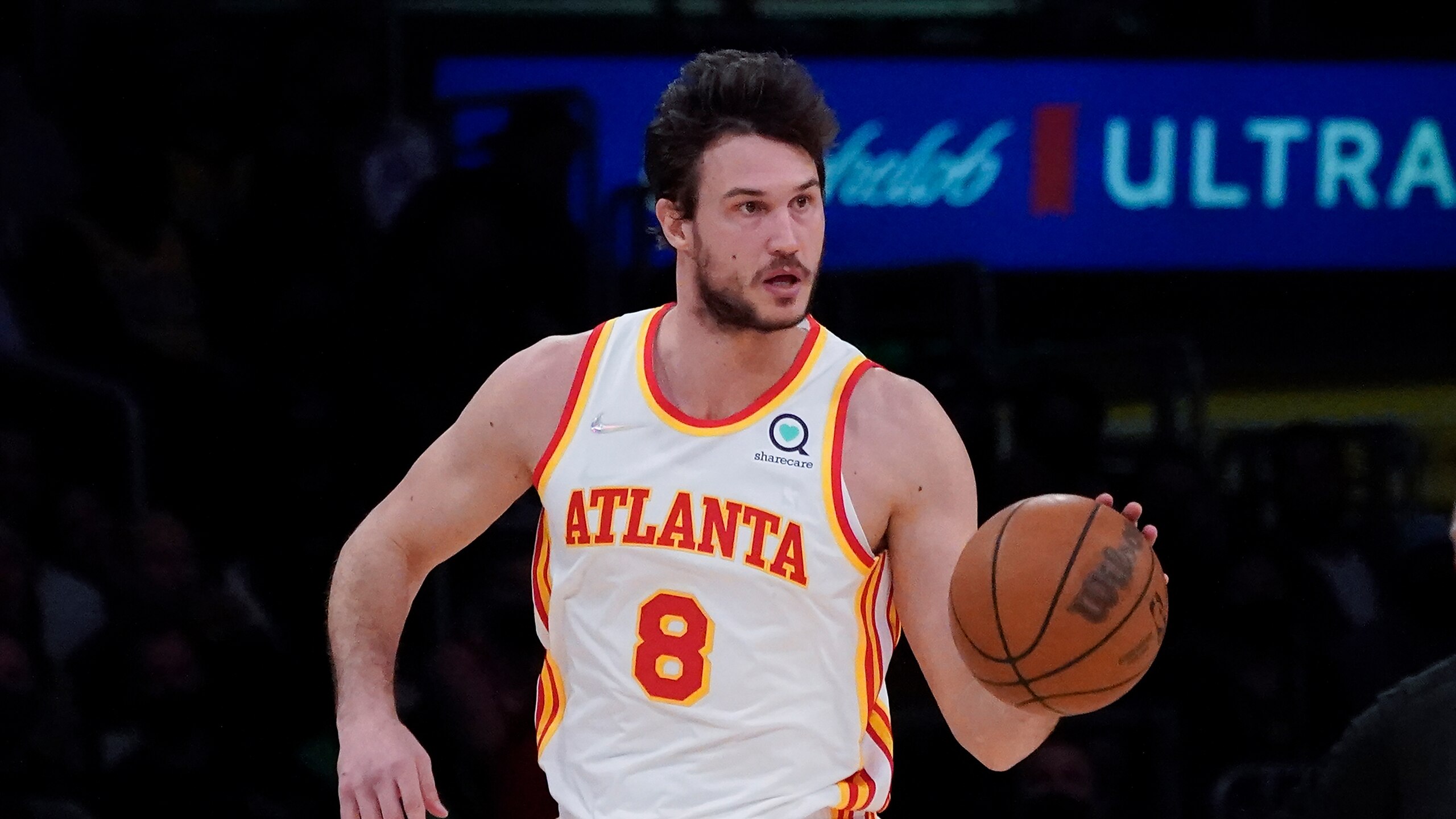 Atlanta Hawks forward Danilo Gallinari (8) controls the ball during an NBA basketball game against the Los Angeles Lakers in Los Angeles, Friday, Jan. 7, 2022. (AP Photo/Ashley Landis)