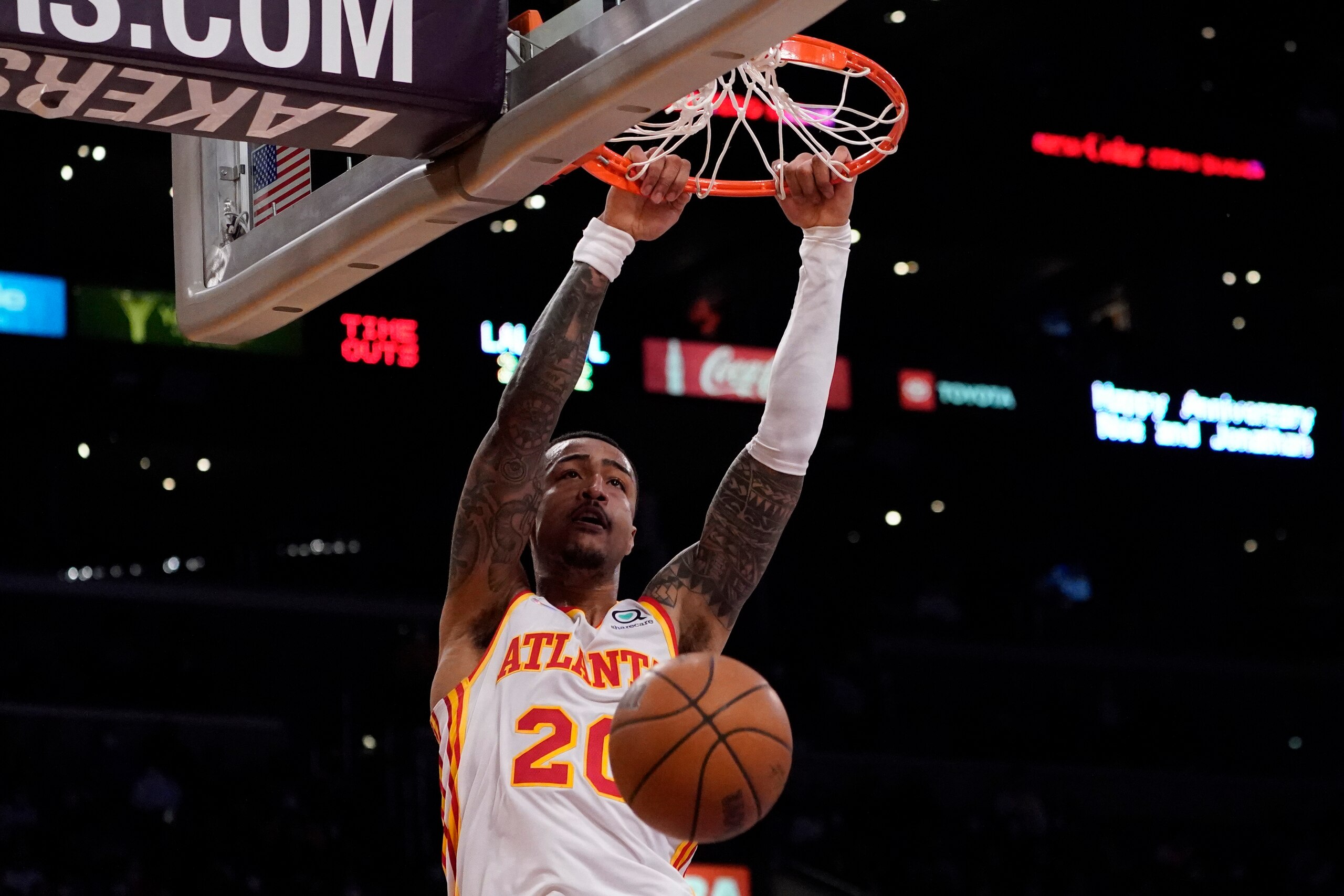 Atlanta Hawks forward John Collins (20) dunks during the second half of an NBA basketball game against the Los Angeles Lakers in Los Angeles, Friday, Jan. 7, 2022. (AP Photo/Ashley Landis) Atlanta Hawks forward John Collins (20) dunks during the second half of an NBA basketball game against the Los Angeles Lakers in Los Angeles, Friday, Jan. 7, 2022. (AP Photo/Ashley Landis)