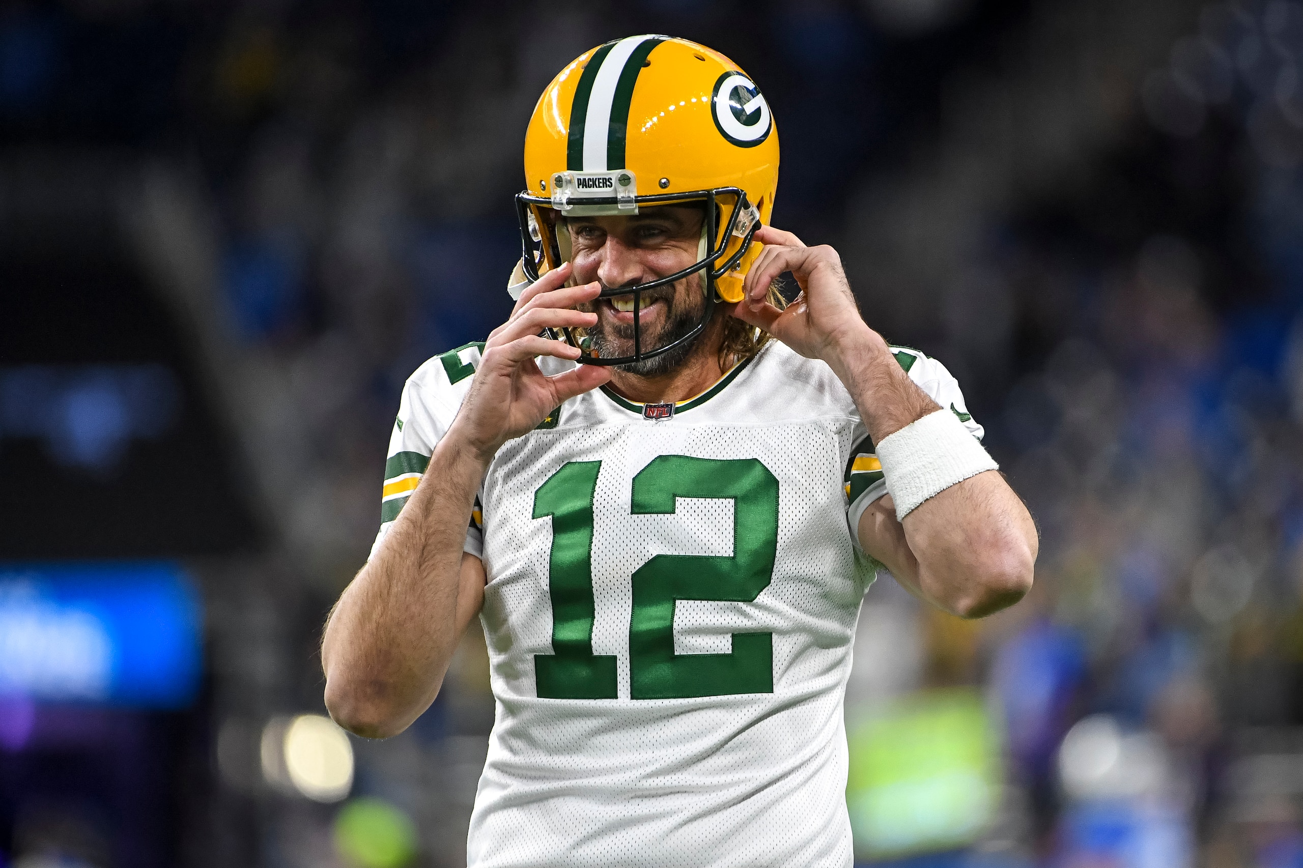 DETROIT, MICHIGAN - JANUARY 09: Aaron Rodgers #12 of the Green Bay Packers looks on before the game against the Detroit Lions at Ford Field on January 09, 2022 in Detroit, Michigan. (Photo by Nic Antaya/Getty Images)