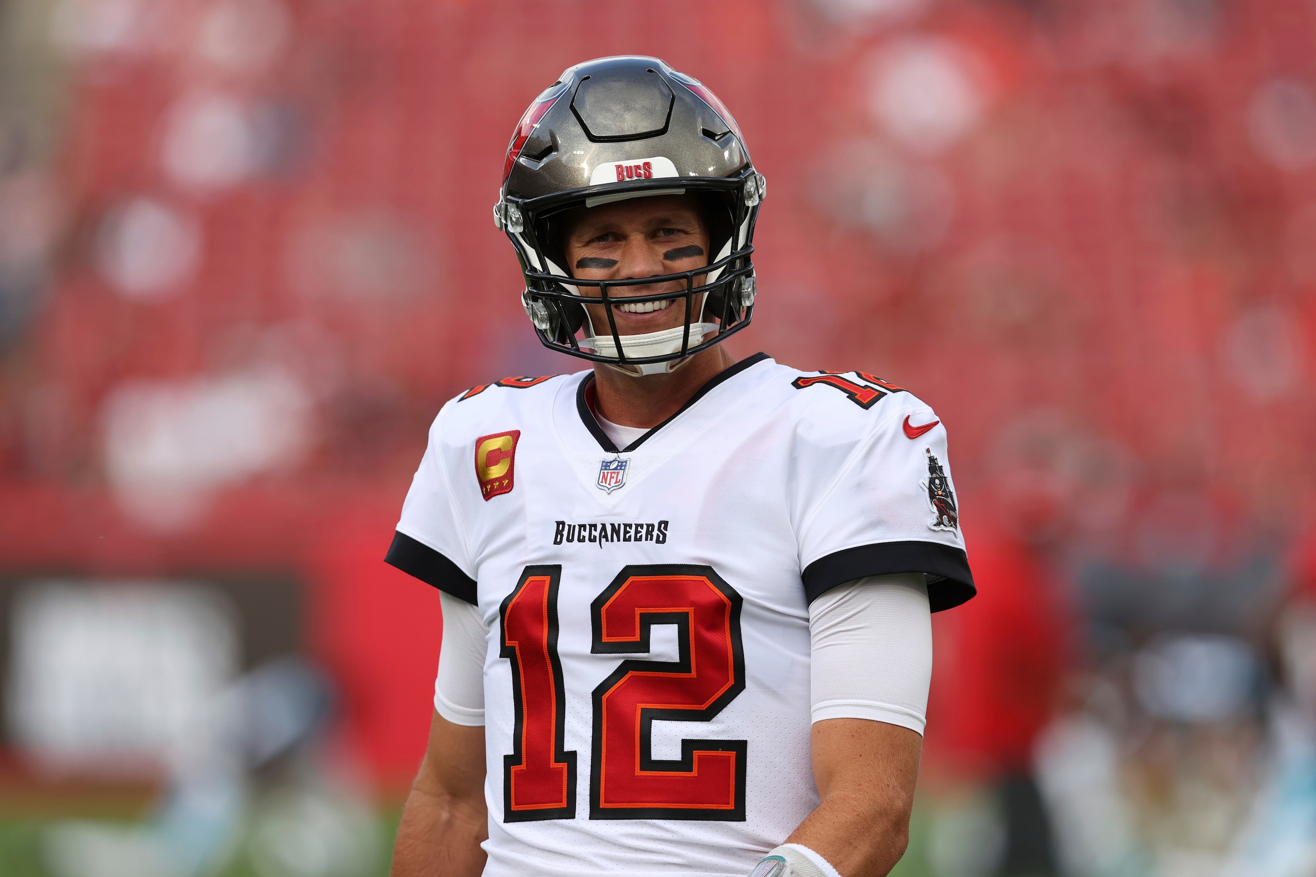 Tampa Bay Buccaneers quarterback Tom Brady (12) before an NFL football game against the Carolina Panthers Sunday, Jan. 9, 2022, in Tampa, Fla. (AP Photo/Mark LoMoglio)