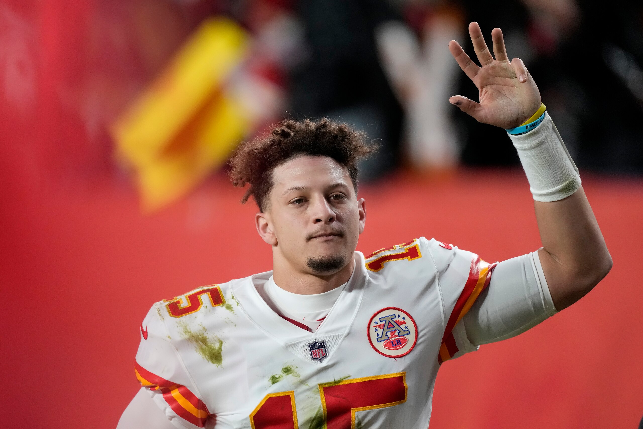 Kansas City Chiefs quarterback Patrick Mahomes (15) waves after the Chiefs defeated the Denver Broncos in an NFL football game Saturday, Jan. 8, 2022, in Denver. (AP Photo/David Zalubowski)