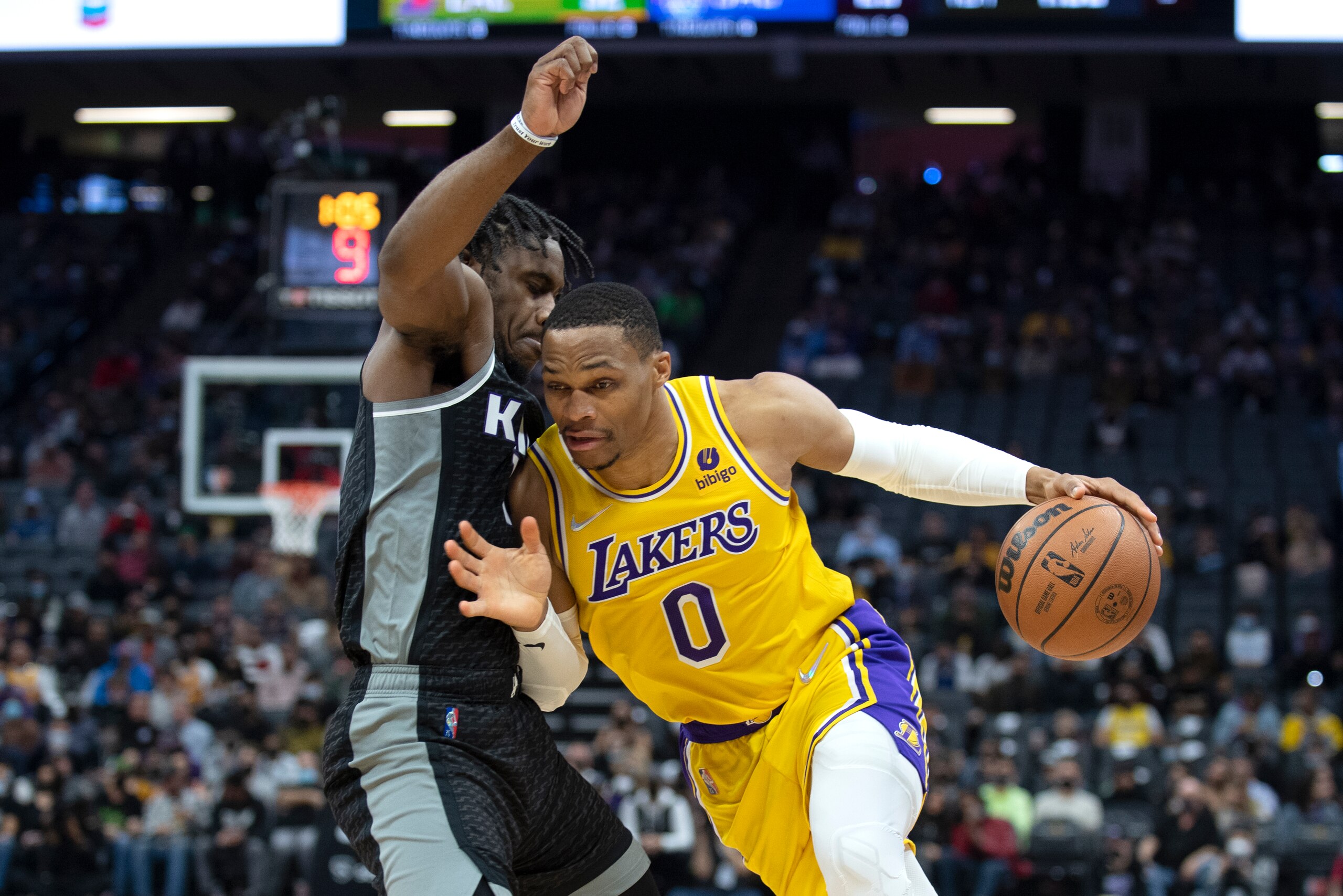 Los Angeles Lakers guard Russell Westbrook (0) tries to drive on Sacramento Kings guard Davion Mitchell, left, in the first quarter of an NBA basketball game in Sacramento, Calif., Wednesday, Jan. 12, 2022. (AP Photo/Josรฉ Luis Villegas) Los Angeles Lakers guard Russell Westbrook (0) tries to drive on Sacramento Kings guard Davion Mitchell, left, in the first quarter of an NBA basketball game in Sacramento, Calif., Wednesday, Jan. 12, 2022. (AP Photo/Josรฉ Luis Villegas)