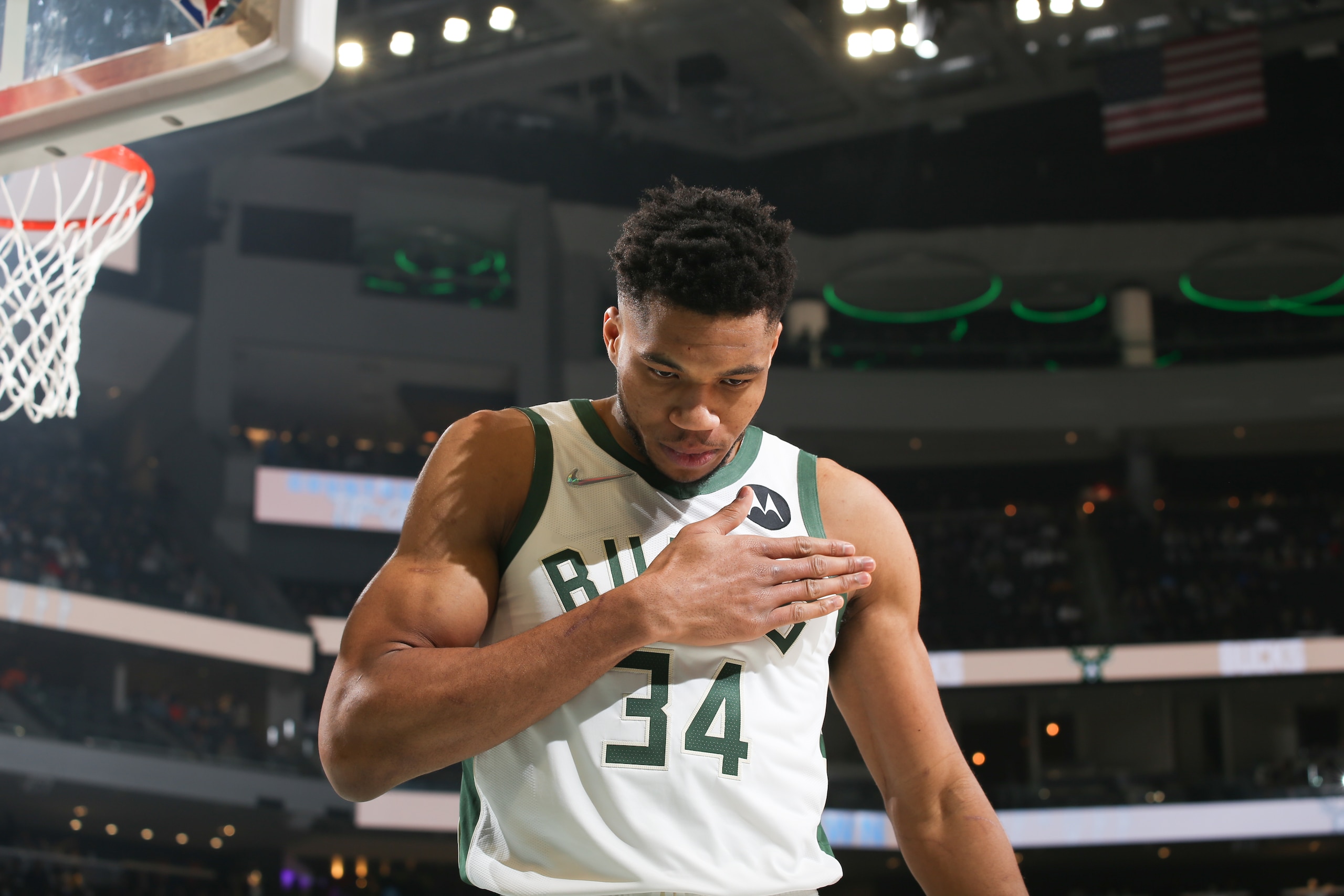 MILWAUKEE, WI - JANUARY 13: Giannis Antetokounmpo #34 of the Milwaukee Bucks looks on before the game against the Golden State Warriors on January 13, 2022 at the Fiserv Forum Center in Milwaukee, Wisconsin. NOTE TO USER: User expressly acknowledges and agrees that, by downloading and or using this Photograph, user is consenting to the terms and conditions of the Getty Images License Agreement. Mandatory Copyright Notice: Copyright 2022 NBAE (Photo by Gary Dineen/NBAE via Getty Images).