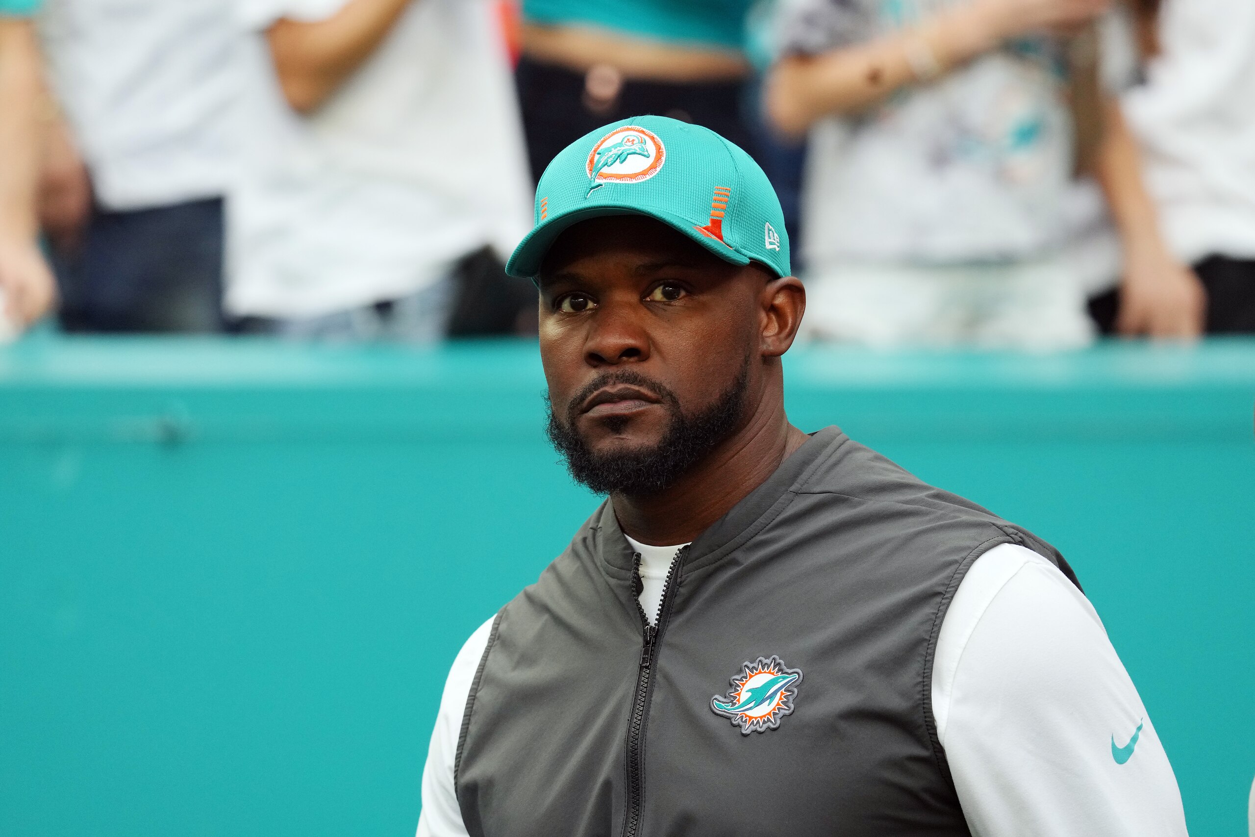 MIAMI GARDENS, FLORIDA - JANUARY 09: Head coach Brian Flores of the Miami Dolphins takes the field during introductions prior to the game against the New England Patriots at Hard Rock Stadium on January 09, 2022 in Miami Gardens, Florida. (Photo by Mark Brown/Getty Images) MIAMI GARDENS, FLORIDA - JANUARY 09: Head coach Brian Flores of the Miami Dolphins takes the field during introductions prior to the game against the New England Patriots at Hard Rock Stadium on January 09, 2022 in Miami Gardens, Florida. (Photo by Mark Brown/Getty Images)