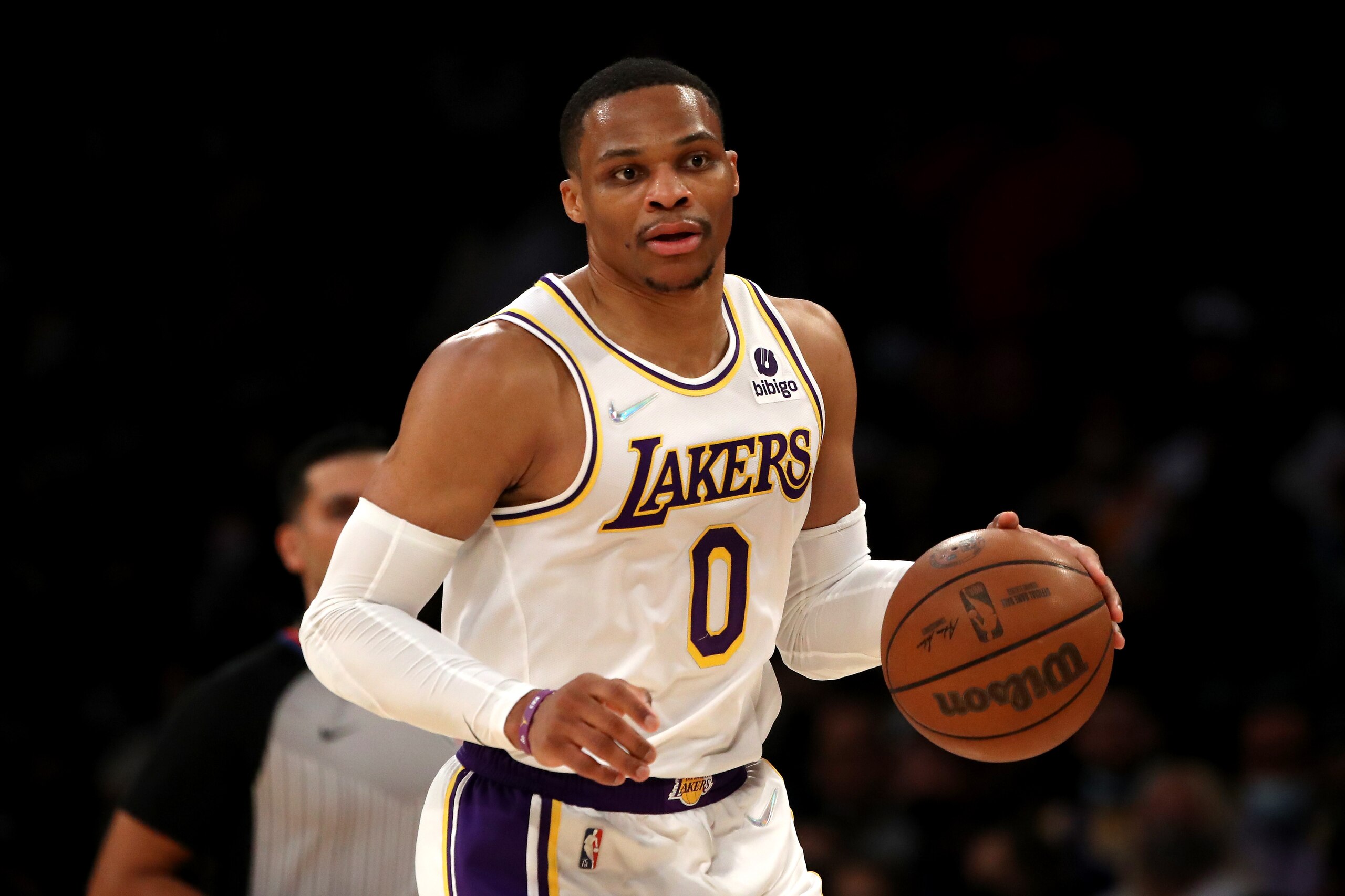 LOS ANGELES, CALIFORNIA - JANUARY 09: Russell Westbrook #0 of the Los Angeles Lakers brings the ball up court during the first quarter  at Crypto.com Arena on January 09, 2022 in Los Angeles, California. NOTE TO USER: User expressly acknowledges and agrees that, by downloading and or using this photograph, User is consenting to the terms and conditions of the Getty Images License Agreement. (Photo by Katelyn Mulcahy/Getty Images)