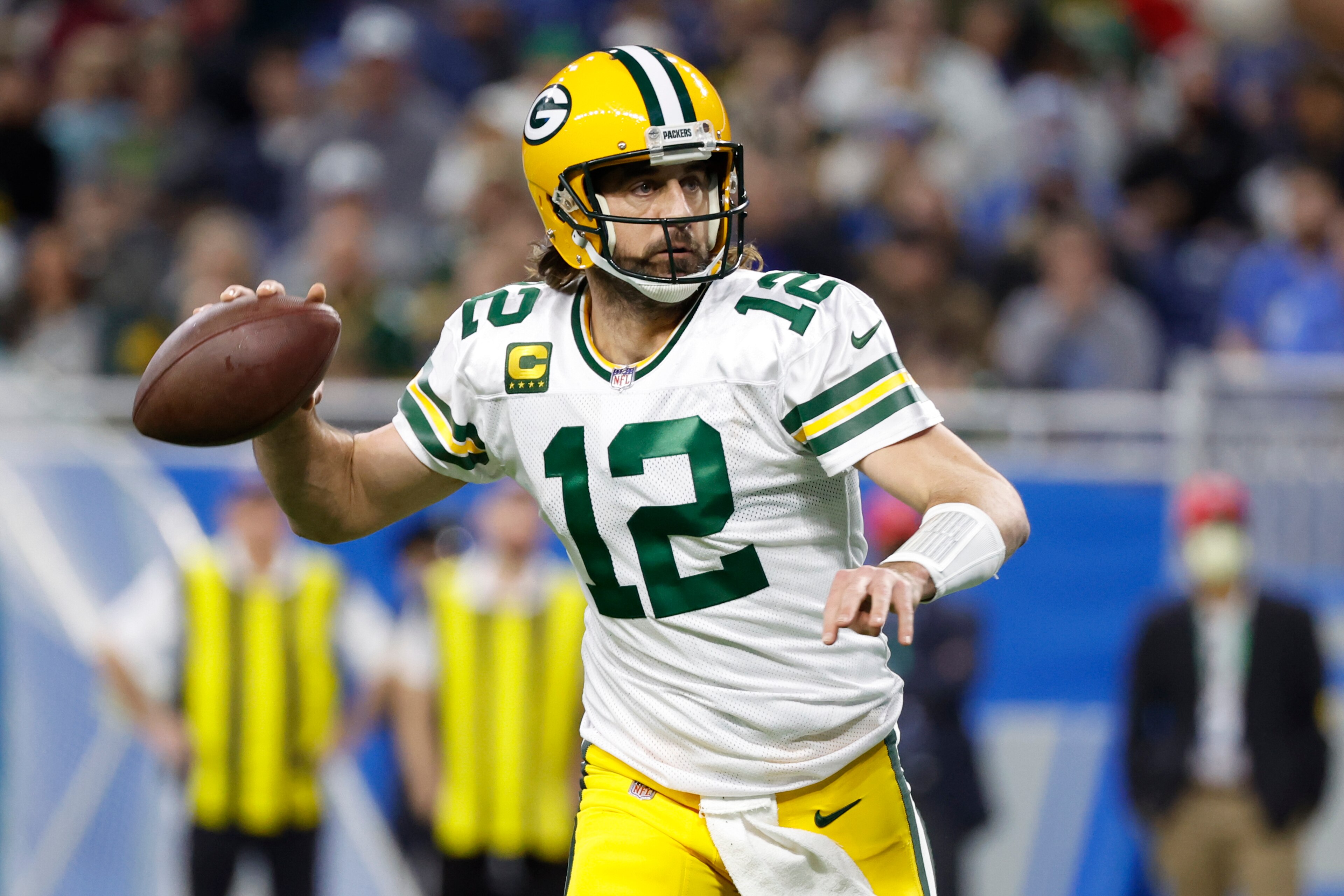 Green Bay Packers quarterback Aaron Rodgers (12) passes against the Detroit Lions in the first half during an NFL football game, Sunday, Jan. 9, 2022, in Detroit. (AP Photo/Rick Osentoski) Green Bay Packers quarterback Aaron Rodgers (12) passes against the Detroit Lions in the first half during an NFL football game, Sunday, Jan. 9, 2022, in Detroit. (AP Photo/Rick Osentoski)