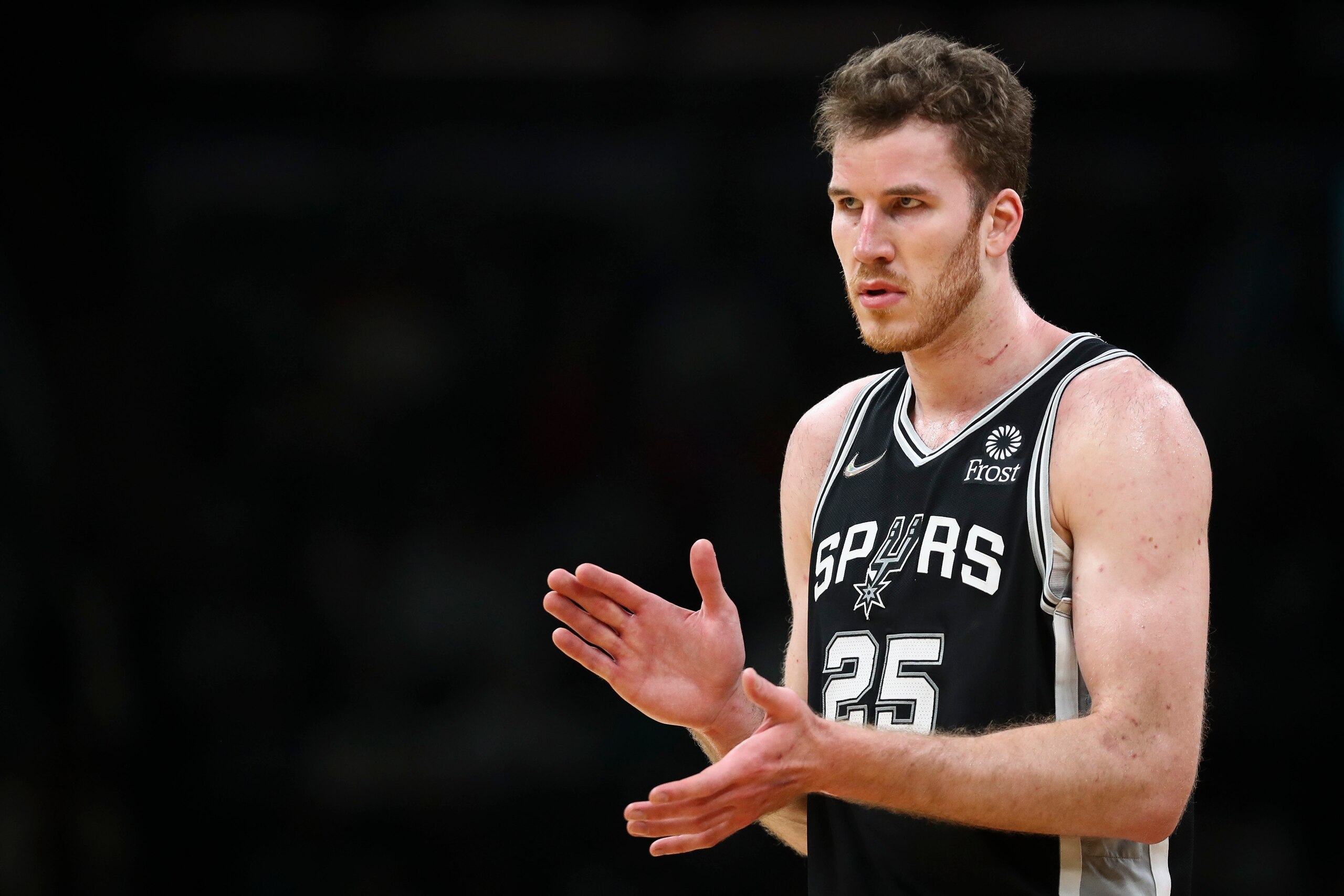 BOSTON, MA - JANUARY 05: Jakob Poeltl #25 of the San Antonio Spurs looks on during a game against the Boston Celtics at TD Garden on January 5, 2022 in Boston, Massachusetts. NOTE TO USER: User expressly acknowledges and agrees that, by downloading and or using this photograph, User is consenting to the terms and conditions of the Getty Images License Agreement. (Photo by Adam Glanzman/Getty Images) BOSTON, MA - JANUARY 05: Jakob Poeltl #25 of the San Antonio Spurs looks on during a game against the Boston Celtics at TD Garden on January 5, 2022 in Boston, Massachusetts. NOTE TO USER: User expressly acknowledges and agrees that, by downloading and or using this photograph, User is consenting to the terms and conditions of the Getty Images License Agreement. (Photo by Adam Glanzman/Getty Images)