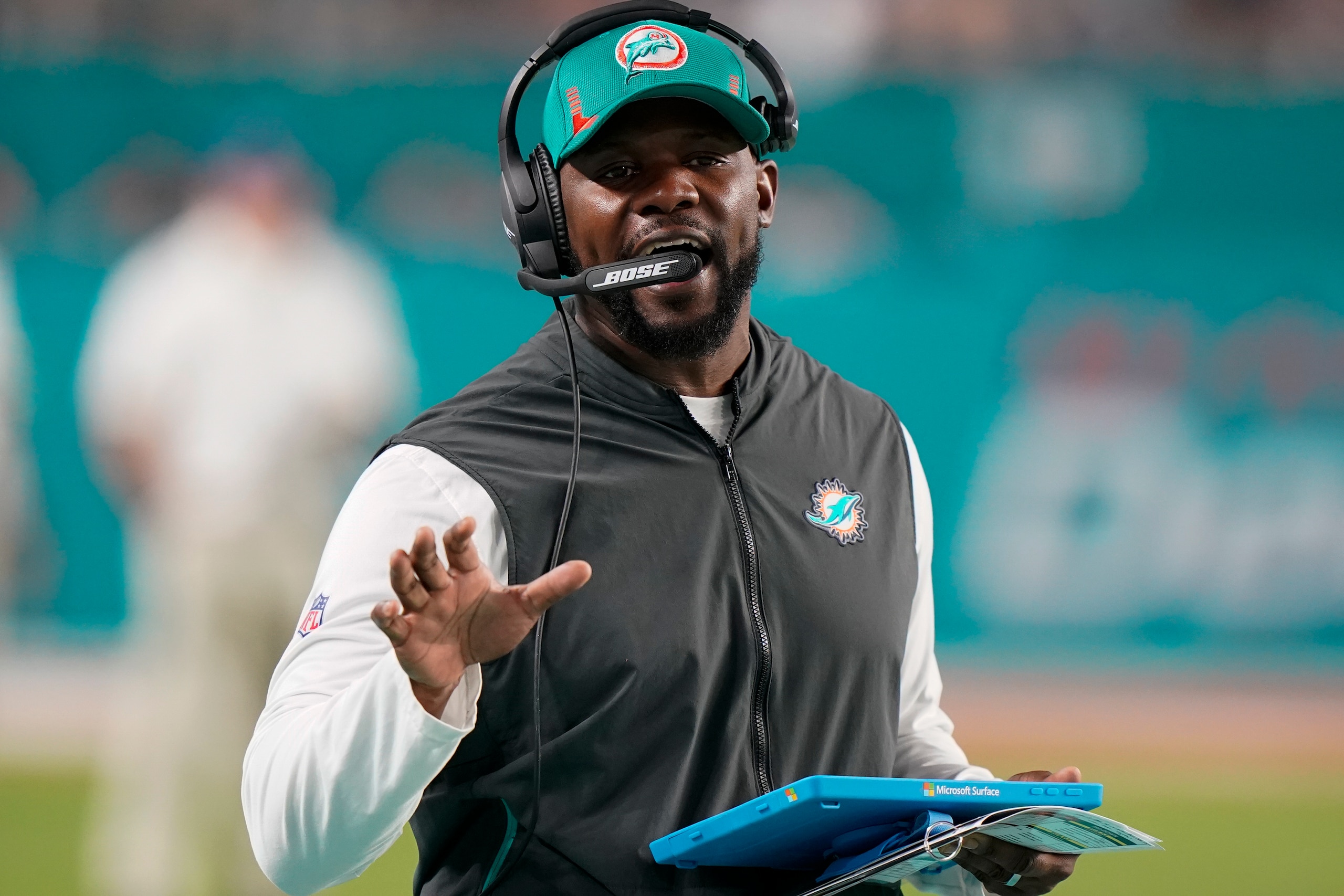 Miami Dolphins head coach Brian Flores directs his team during the second half of an NFL football game against the New England Patriots, Sunday, Jan. 9, 2022, in Miami Gardens, Fla. (AP Photo/Wilfredo Lee) Miami Dolphins head coach Brian Flores directs his team during the second half of an NFL football game against the New England Patriots, Sunday, Jan. 9, 2022, in Miami Gardens, Fla. (AP Photo/Wilfredo Lee)