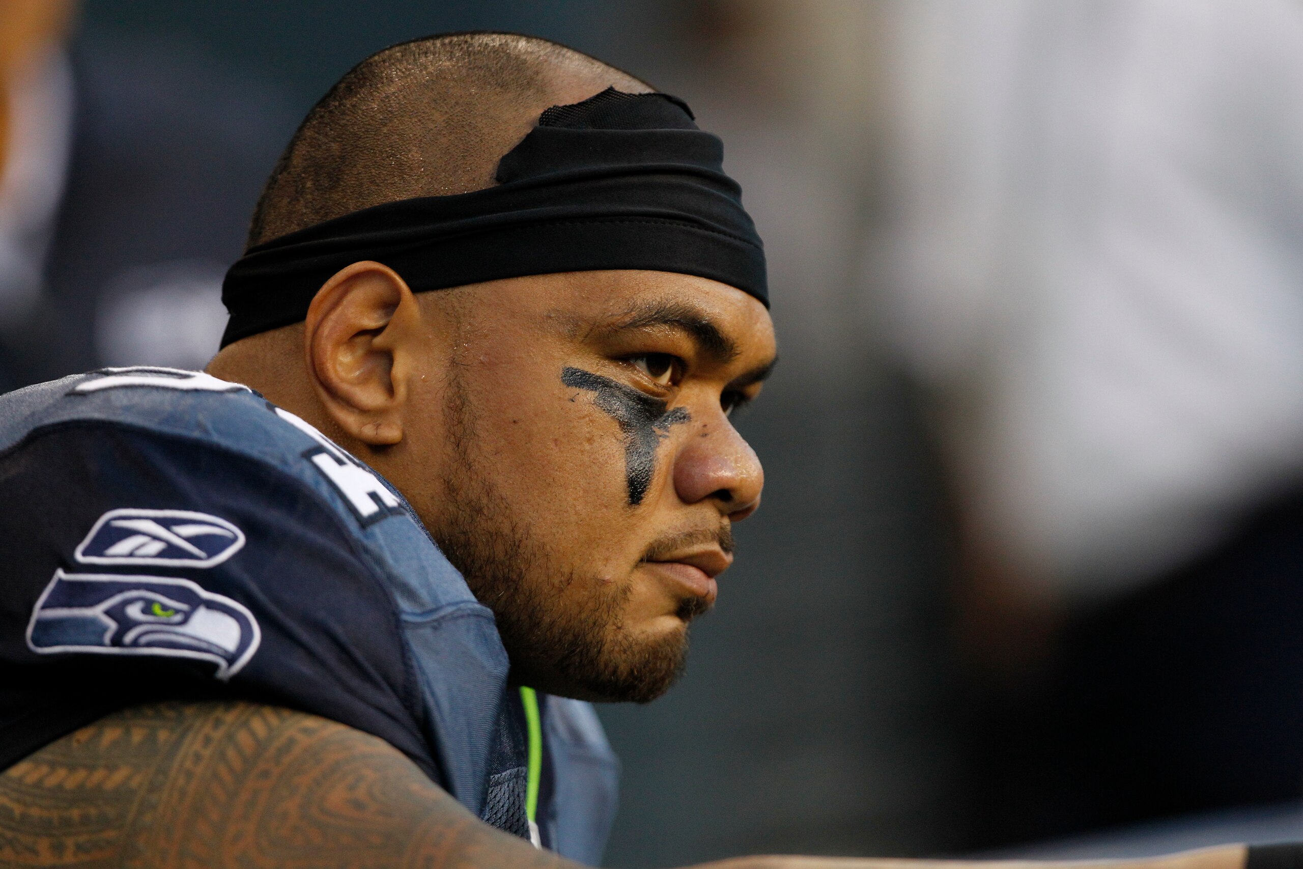 Seattle Seahawks' Junior Siavii on the sidelines against the Oakland Raiders in the first half of a preseason NFL football game, Friday, Sept. 2, 2011, in Seattle. (AP Photo/Elaine Thompson)