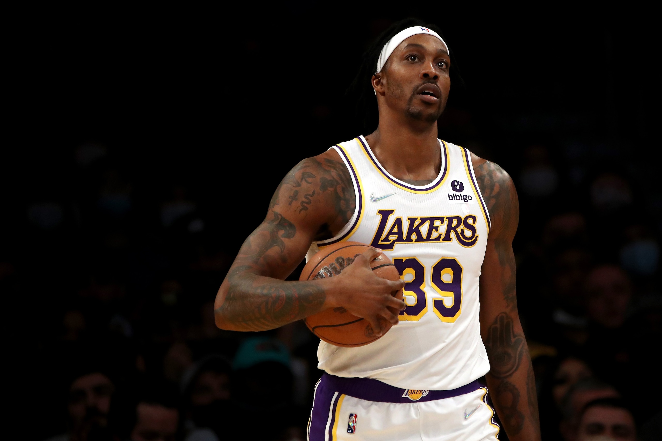 LOS ANGELES, CALIFORNIA - JANUARY 09: Dwight Howard #39 of the Los Angeles Lakers looks on during the third quarter against the Memphis Grizzlies at Crypto.com Arena on January 09, 2022 in Los Angeles, California. NOTE TO USER: User expressly acknowledges and agrees that, by downloading and or using this photograph, User is consenting to the terms and conditions of the Getty Images License Agreement. (Photo by Katelyn Mulcahy/Getty Images) LOS ANGELES, CALIFORNIA - JANUARY 09: Dwight Howard #39 of the Los Angeles Lakers looks on during the third quarter against the Memphis Grizzlies at Crypto.com Arena on January 09, 2022 in Los Angeles, California. NOTE TO USER: User expressly acknowledges and agrees that, by downloading and or using this photograph, User is consenting to the terms and conditions of the Getty Images License Agreement. (Photo by Katelyn Mulcahy/Getty Images)