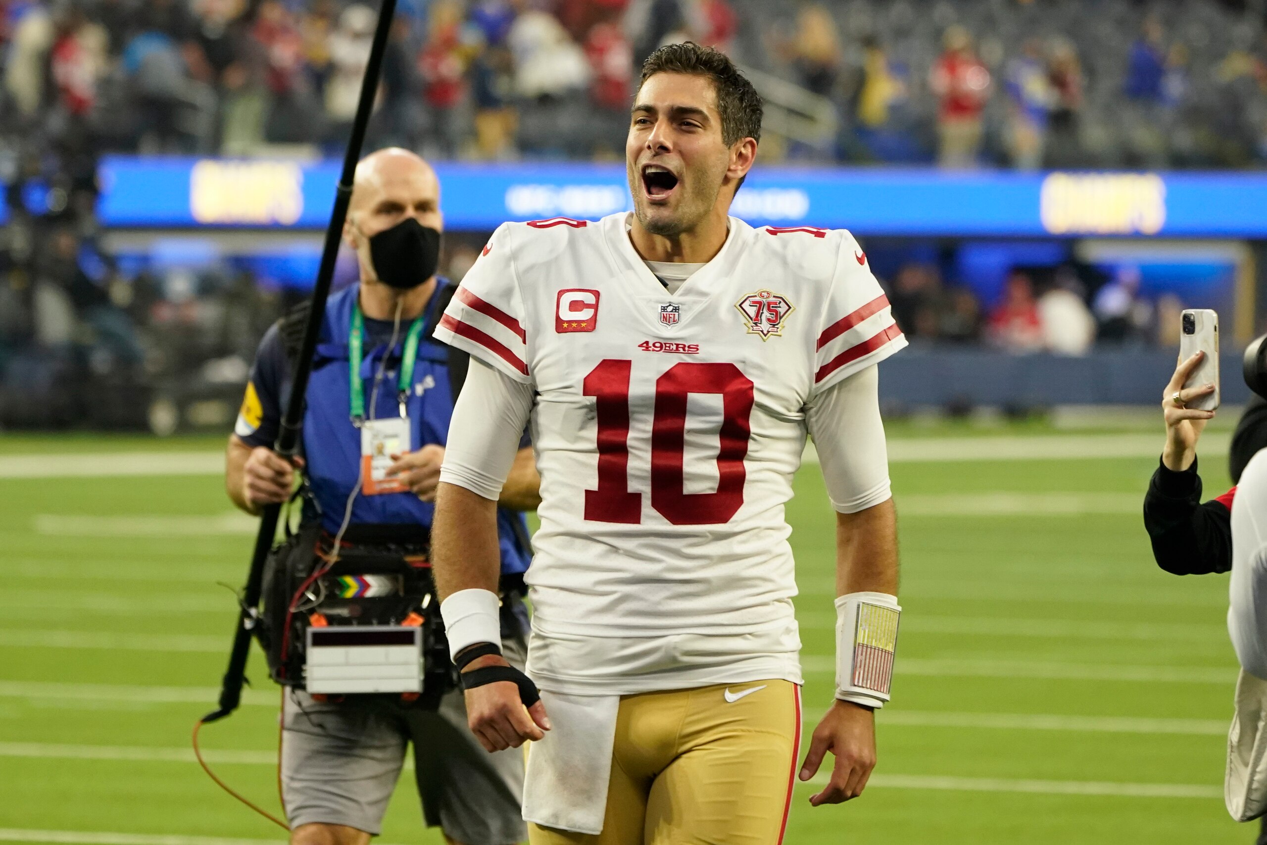 San Francisco 49ers quarterback Jimmy Garoppolo (10) leaves the field after a 27-24 win over the Los Angeles Rams in an NFL football game Sunday, Jan. 9, 2022, in Inglewood, Calif. (AP Photo/Marcio Jose Sanchez)