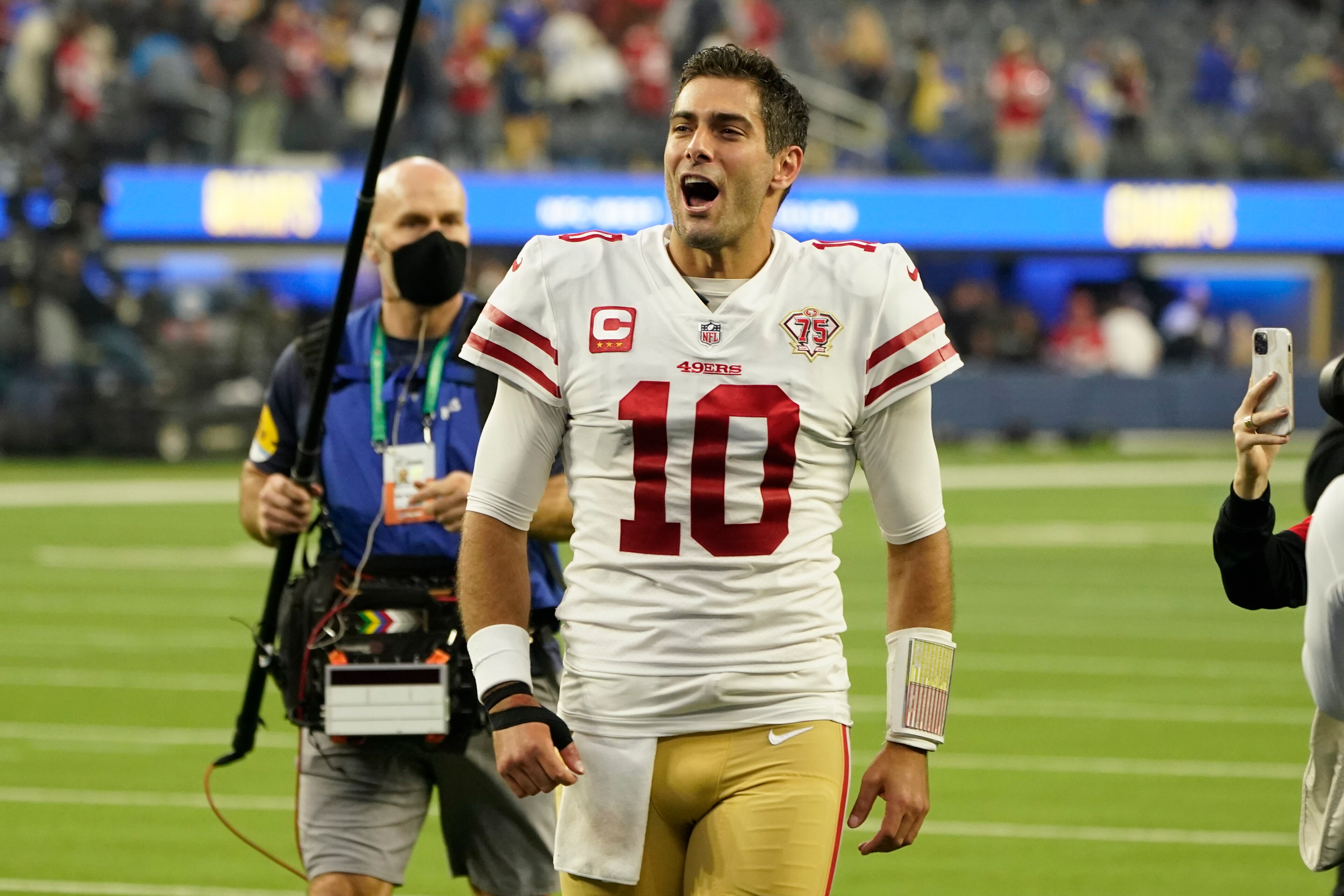 San Francisco 49ers quarterback Jimmy Garoppolo (10) leaves the field after a 27-24 win over the Los Angeles Rams in an NFL football game Sunday, Jan. 9, 2022, in Inglewood, Calif. (AP Photo/Marcio Jose Sanchez)
