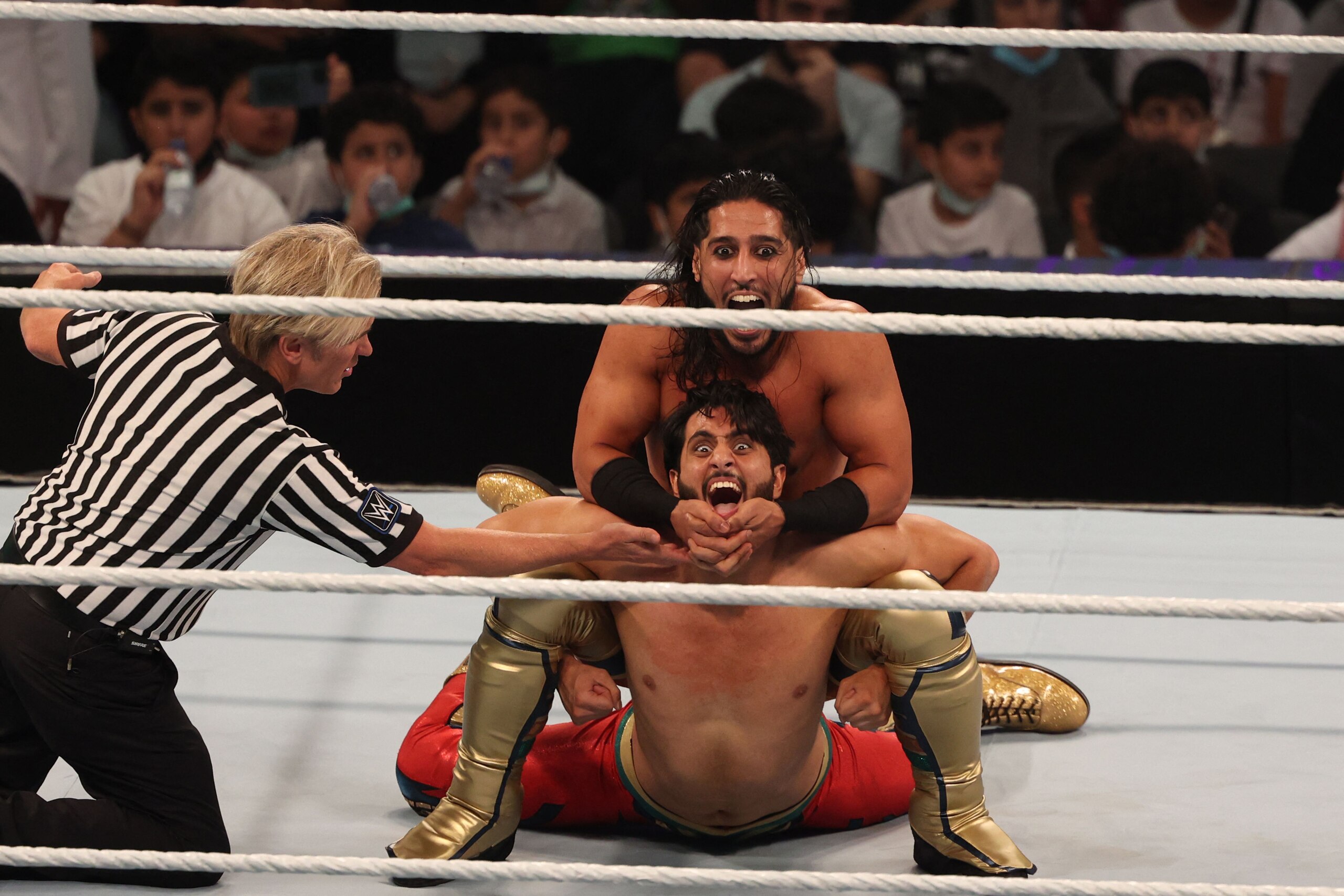 Mansoor (bottom) competes with Mustafa Ali during the World Wrestling Entertainment (WWE) Crown Jewel pay-per-view in the Saudi capital Riyadh on October 21, 2021. (Photo by Fayez Nureldine / AFP) (Photo by FAYEZ NURELDINE/AFP via Getty Images)