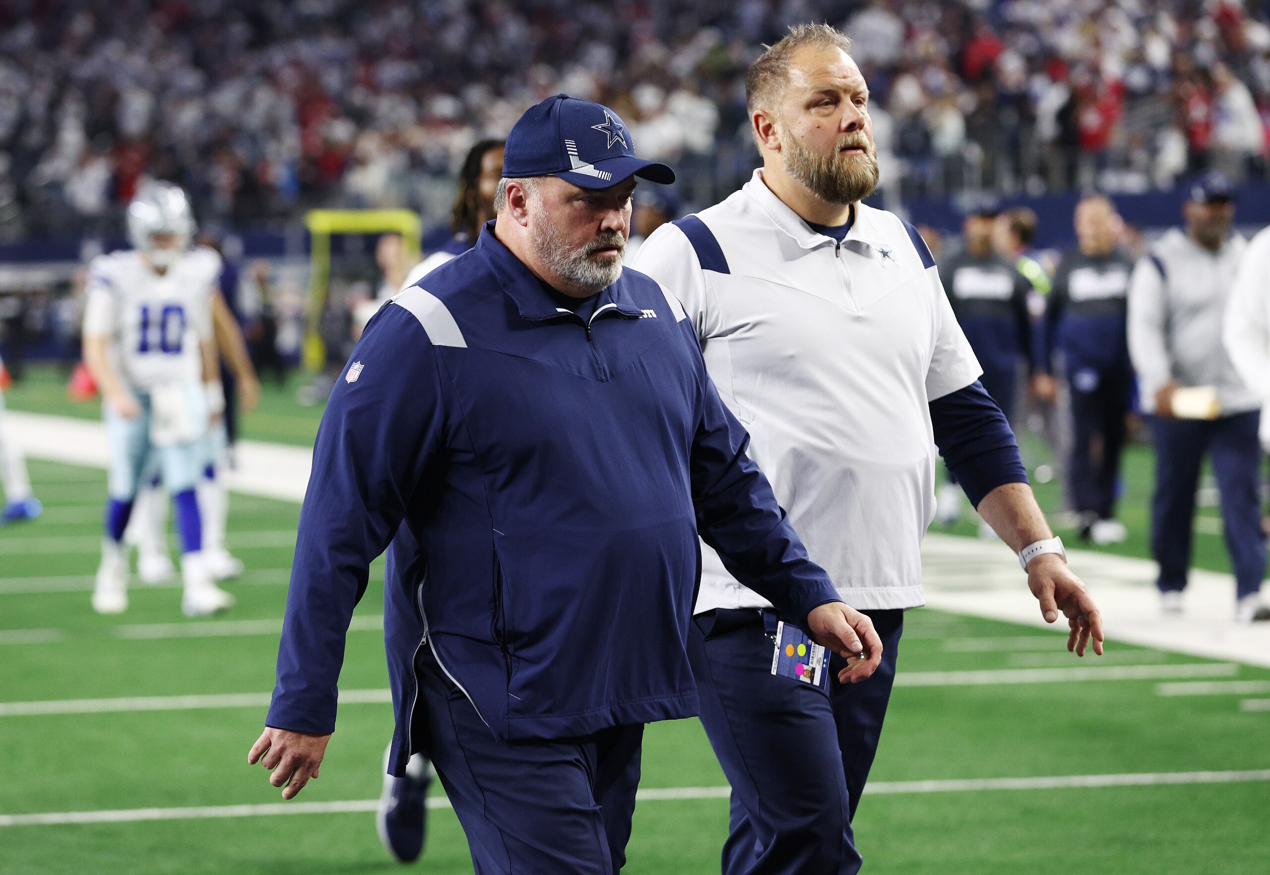 ARLINGTON, TEXAS - JANUARY 16: ead coach Mike McCarthy of the Dallas Cowboys walks off the field after losing to the San Francisco 49ers 23-17 in the NFC Wild Card Playoff game at AT&T Stadium on January 16, 2022 in Arlington, Texas. (Photo by Tom Pennington/Getty Images)