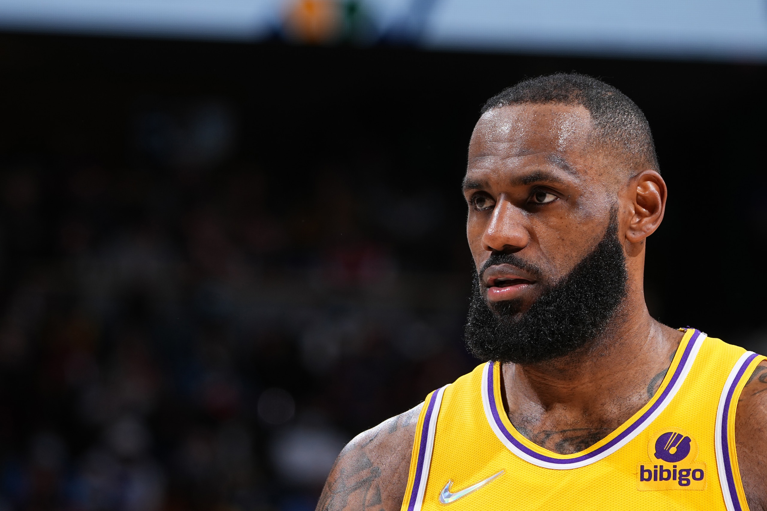 DENVER, CO - JANUARY 15: LeBron James #6 of the Los Angeles Lakers looks on during a game on January 15, 2022 at the Ball Arena in Denver, Colorado. NOTE TO USER: User expressly acknowledges and agrees that, by downloading and/or using this Photograph, user is consenting to the terms and conditions of the Getty Images License Agreement. Mandatory Copyright Notice: Copyright 2021 NBAE (Photo by Garrett Ellwood/NBAE via Getty Images)