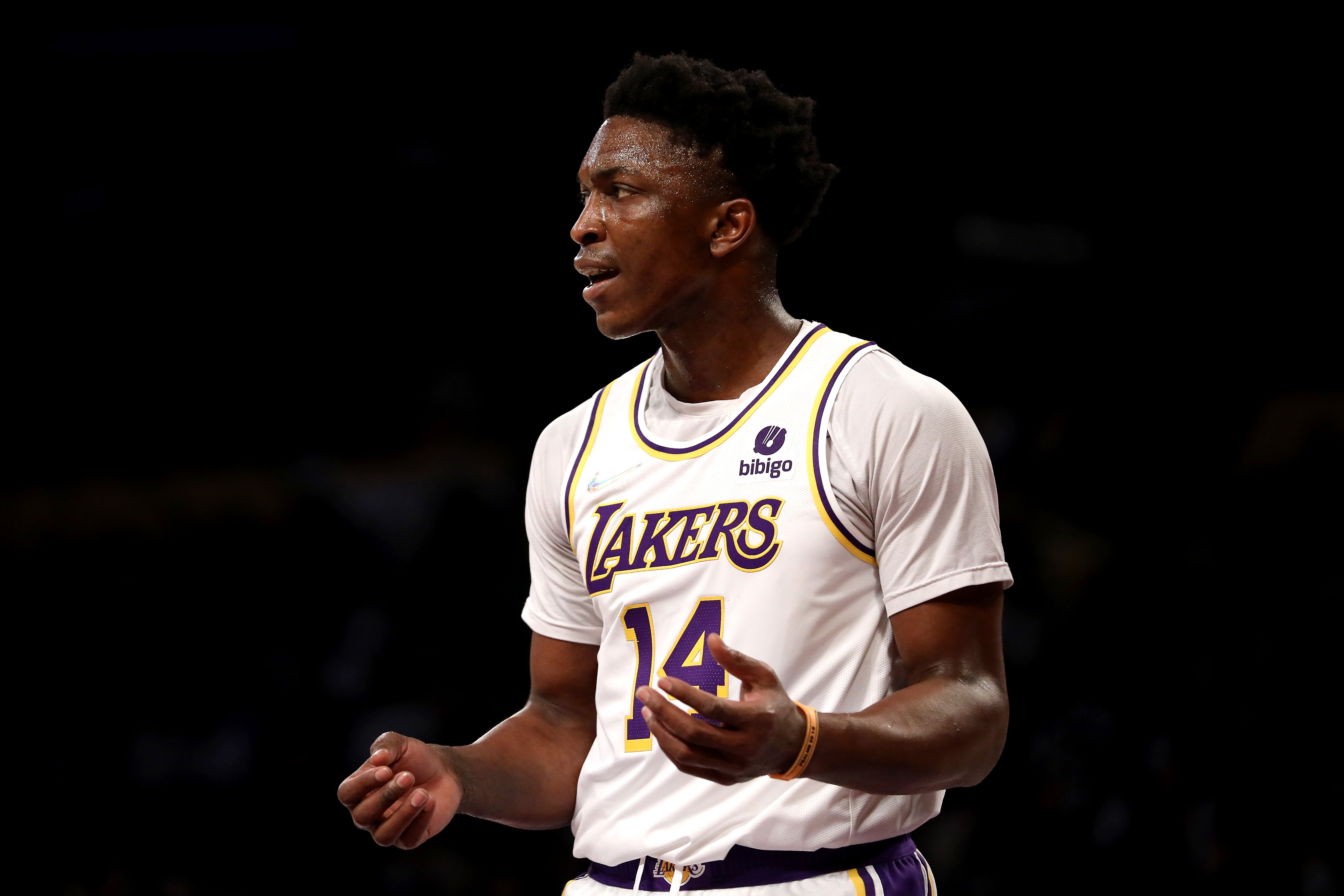 LOS ANGELES, CALIFORNIA - JANUARY 02: Stanley Johnson #14 of the Los Angeles Lakers reacts to a play during the first quarter against the Minnesota Timberwolves at Crypto.com Arena on January 02, 2022 in Los Angeles, California. NOTE TO USER: User expressly acknowledges and agrees that, by downloading and or using this photograph, User is consenting to the terms and conditions of the Getty Images License Agreement. (Photo by Katelyn Mulcahy/Getty Images)
