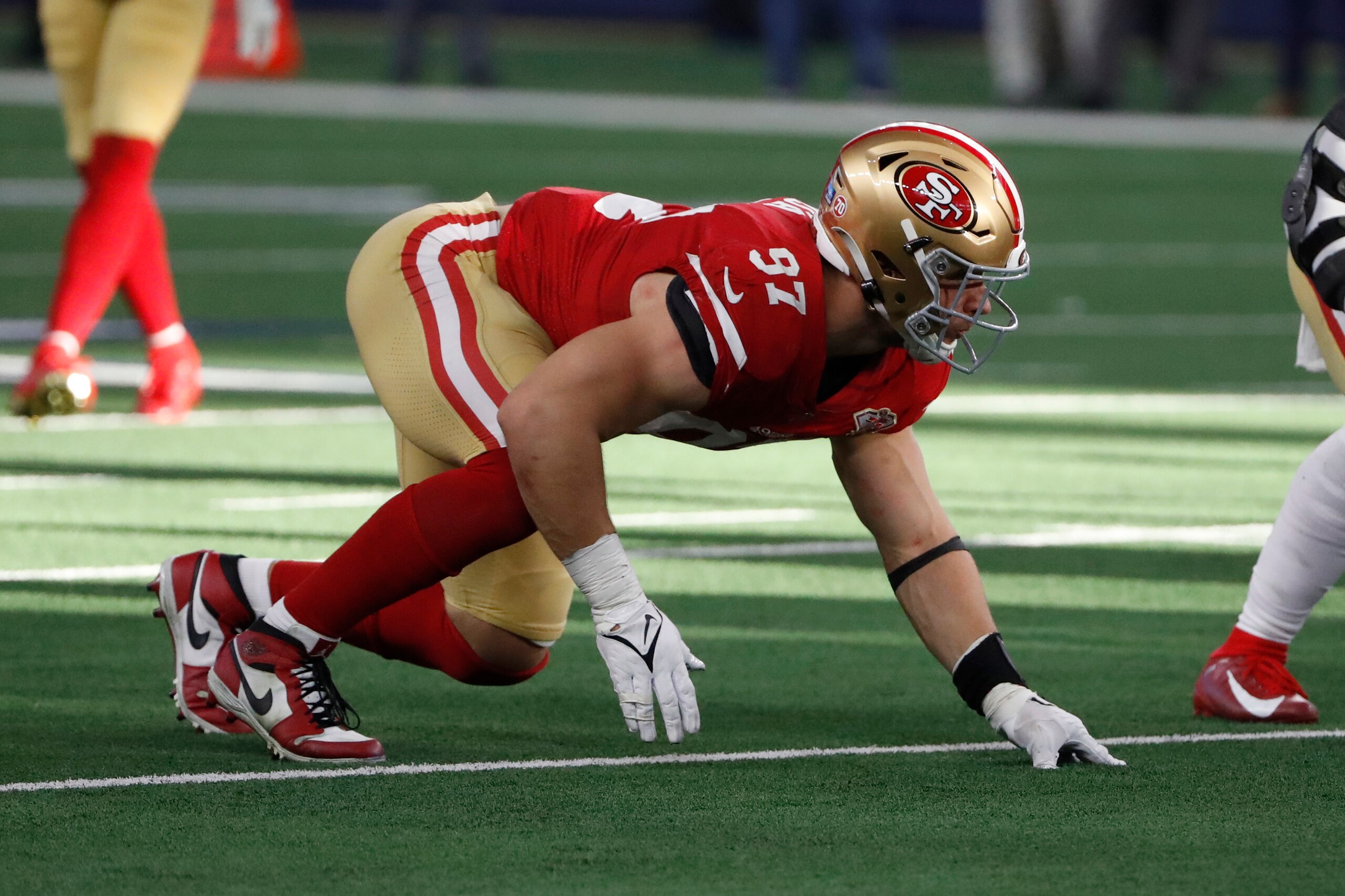 San Francisco 49ers defensive end Nick Bosa (97) against the Dallas Cowboys during the first half of an NFL wild-card playoff football game in Arlington, Texas, Sunday, Jan. 16, 2022. (AP Photo/Roger Steinman)