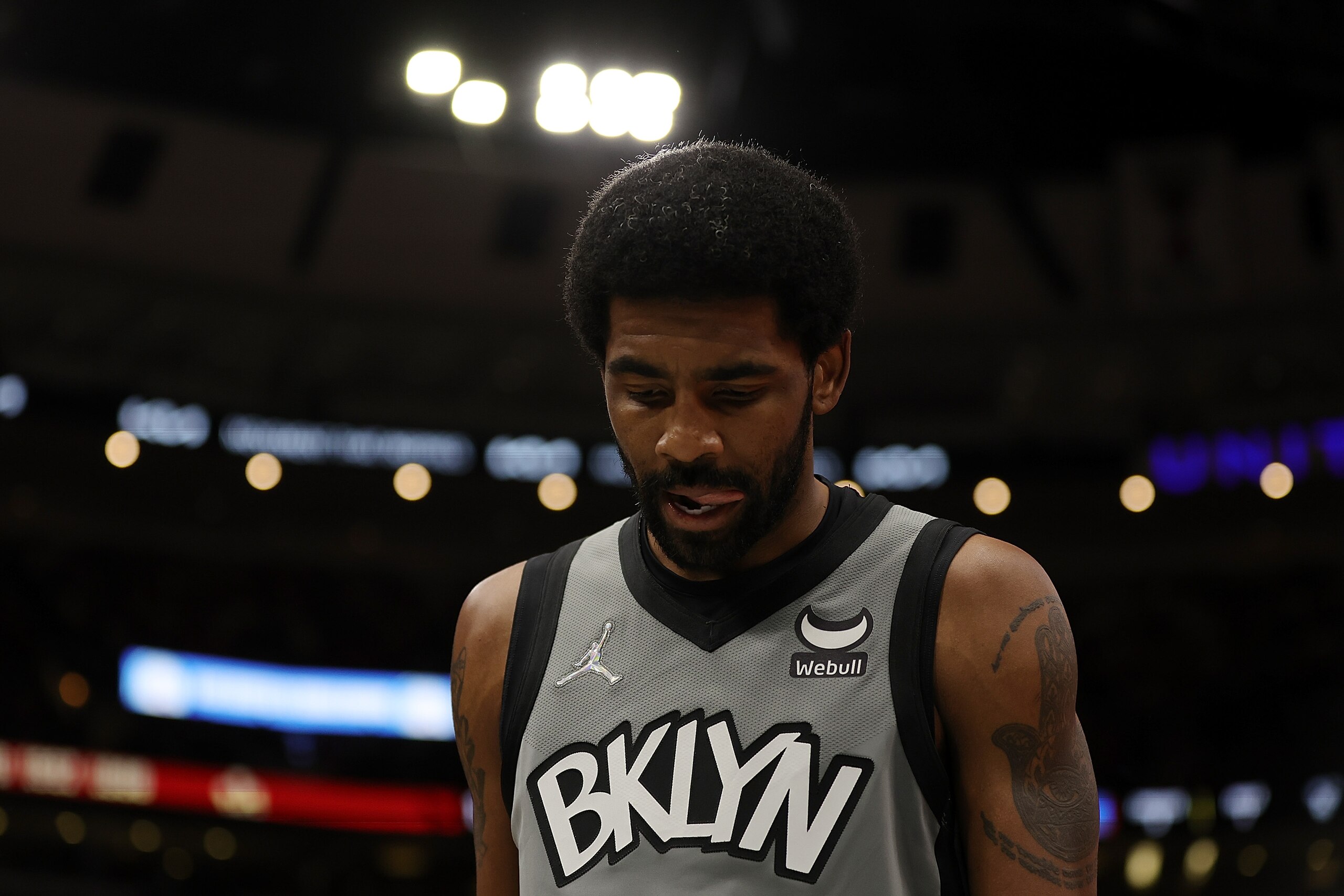 CHICAGO, ILLINOIS - JANUARY 12: Kyrie Irving #11 of the Brooklyn Nets walks backcourt during a game against the Chicago Bulls at United Center on January 12, 2022 in Chicago, Illinois. NOTE TO USER: User expressly acknowledges and agrees that, by downloading and or using this photograph, User is consenting to the terms and conditions of the Getty Images License Agreement. (Photo by Stacy Revere/Getty Images)