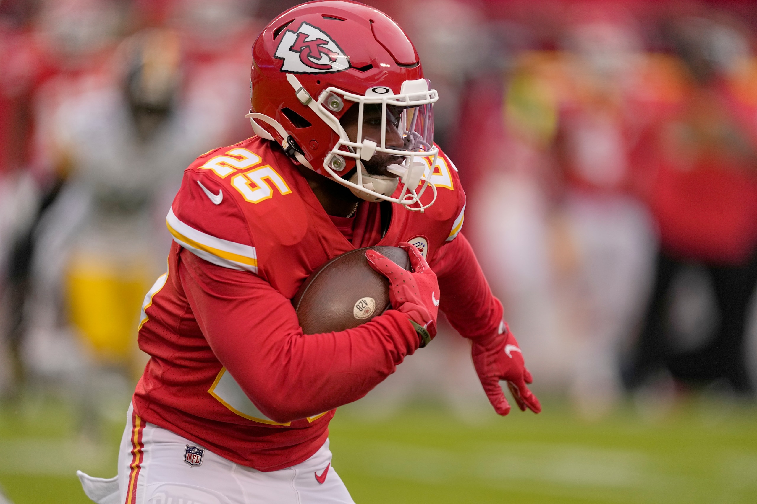 Kansas City Chiefs running back Clyde Edwards-Helaire runs with the ball during the first half of an NFL football game against the Pittsburgh Steelers Sunday, Dec. 26, 2021, in Kansas City, Mo. (AP Photo/Charlie Riedel) Kansas City Chiefs running back Clyde Edwards-Helaire runs with the ball during the first half of an NFL football game against the Pittsburgh Steelers Sunday, Dec. 26, 2021, in Kansas City, Mo. (AP Photo/Charlie Riedel)