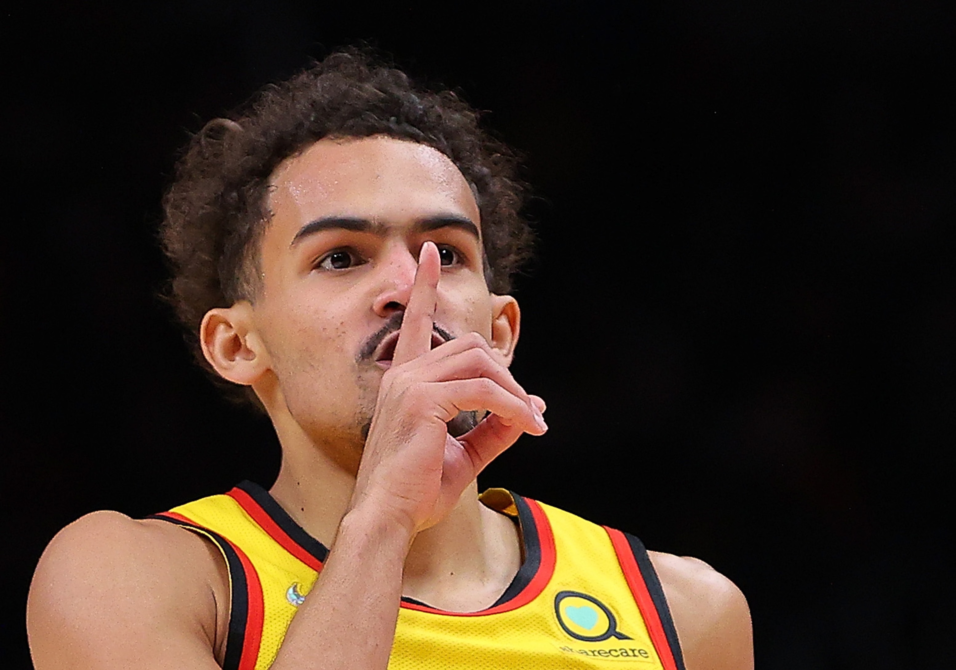 ATLANTA, GEORGIA - JANUARY 17: Trae Young #11 of the Atlanta Hawks reacts after hitting a three-point basket against the Milwaukee Bucks during the first half at State Farm Arena on January 17, 2022 in Atlanta, Georgia. NOTE TO USER: User expressly acknowledges and agrees that, by downloading and or using this photograph, User is consenting to the terms and conditions of the Getty Images License Agreement. (Photo by Kevin C. Cox/Getty Images) ATLANTA, GEORGIA - JANUARY 17: Trae Young #11 of the Atlanta Hawks reacts after hitting a three-point basket against the Milwaukee Bucks during the first half at State Farm Arena on January 17, 2022 in Atlanta, Georgia. NOTE TO USER: User expressly acknowledges and agrees that, by downloading and or using this photograph, User is consenting to the terms and conditions of the Getty Images License Agreement. (Photo by Kevin C. Cox/Getty Images)