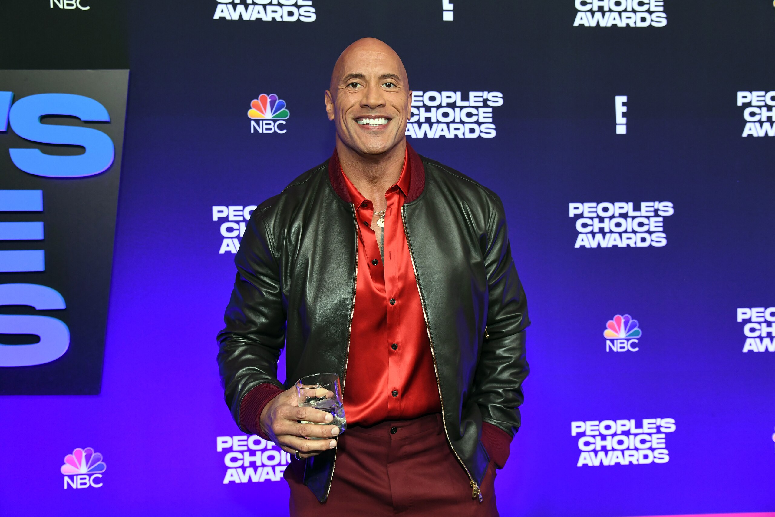 SANTA MONICA, CALIFORNIA - DECEMBER 07: Dwayne Johnson attends the People's Choice Awards at Barker Hangar on December 07, 2021 in Santa Monica, California. (Photo by Kevin Mazur/Getty Images for DJ) SANTA MONICA, CALIFORNIA - DECEMBER 07: Dwayne Johnson attends the People's Choice Awards at Barker Hangar on December 07, 2021 in Santa Monica, California. (Photo by Kevin Mazur/Getty Images for DJ)