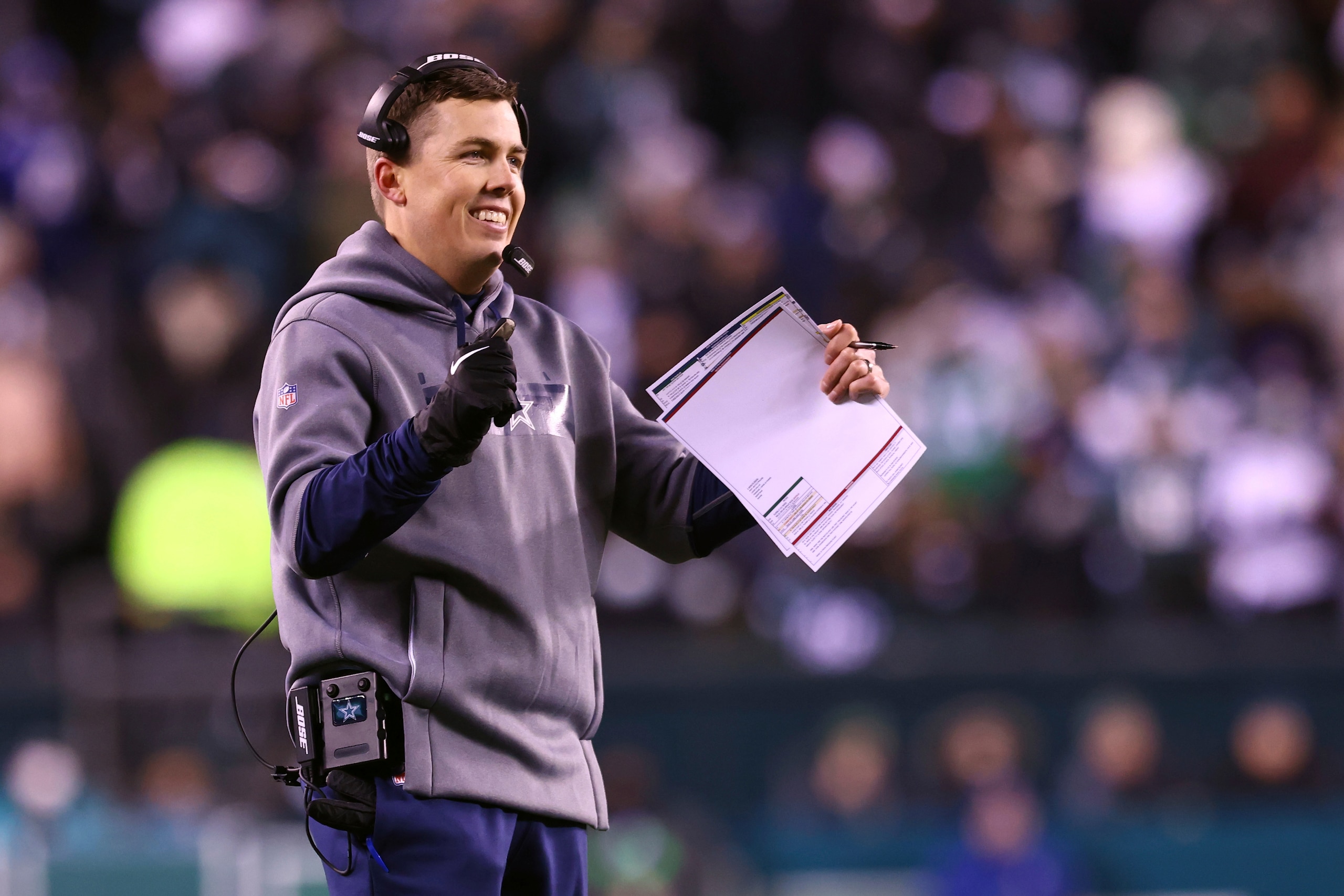 Dallas Cowboys offensive coordinator Kellen Moore on the sidelines during the first half of an NFL football game against the Philadelphia Eagles, Saturday, Jan. 8, 2022, in Philadelphia. The Cowboys defeated the Eagles 51-26. (AP Photo/Rich Schultz)