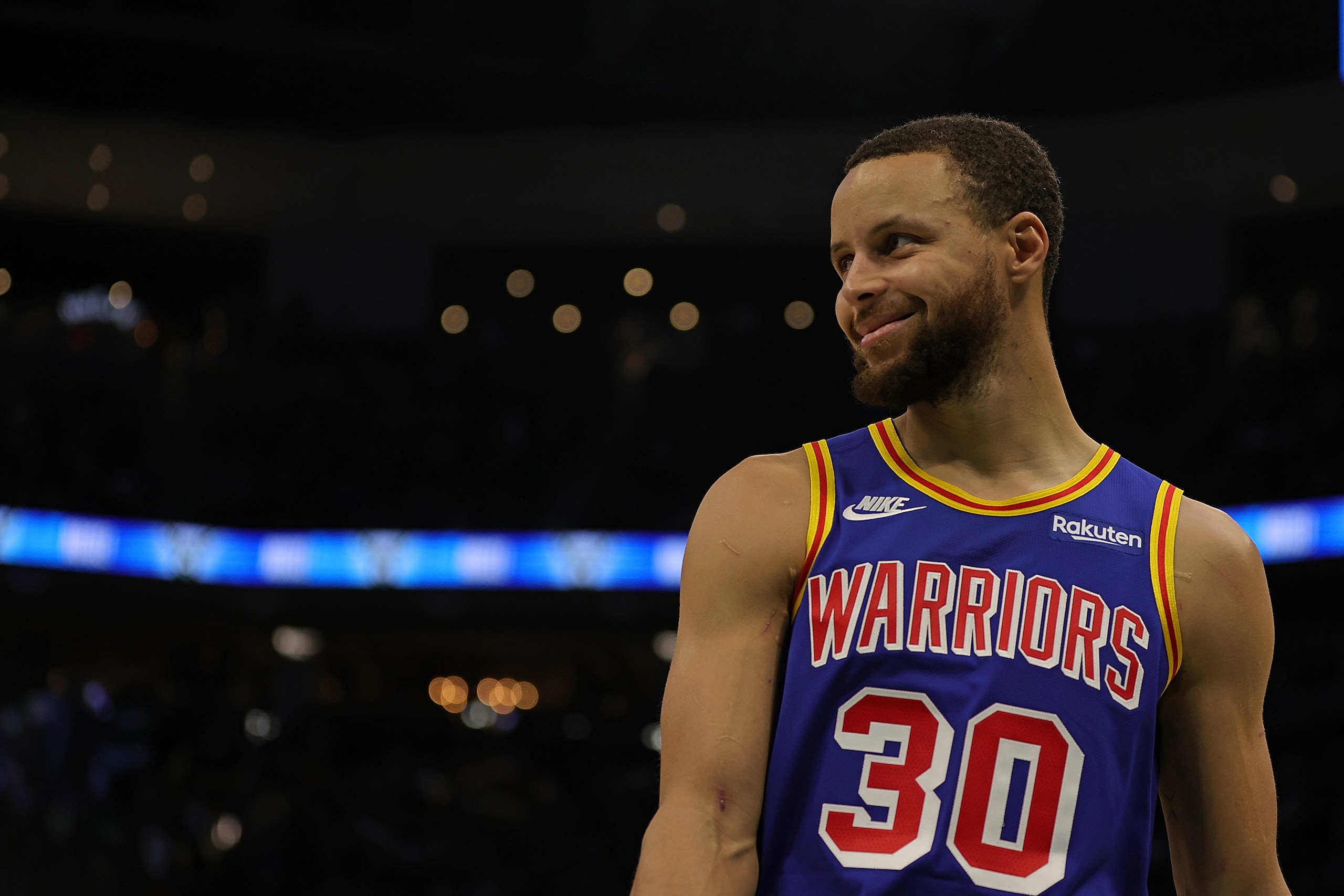 MILWAUKEE, WISCONSIN - JANUARY 13: Stephen Curry #30 of the Golden State Warriors waits for a free throw during a game against the Milwaukee Bucks at Fiserv Forum on January 13, 2022 in Milwaukee, Wisconsin. NOTE TO USER: User expressly acknowledges and agrees that, by downloading and or using this photograph, User is consenting to the terms and conditions of the Getty Images License Agreement. (Photo by Stacy Revere/Getty Images)