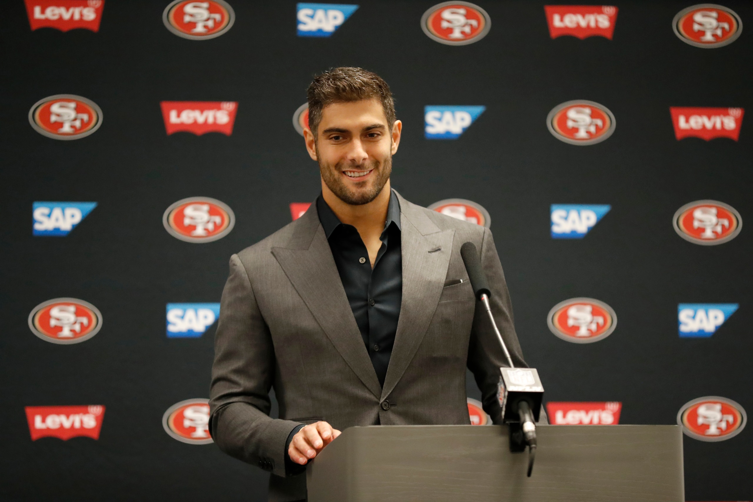 San Francisco 49ers quarterback Jimmy Garoppolo participates in a post game press conference after an NFL football game against the Dallas Cowboys in Arlington, Texas, Sunday, Jan. 16, 2022. San Francisco beat Dallas 23-17. (AP Photo/Roger Steinman)
