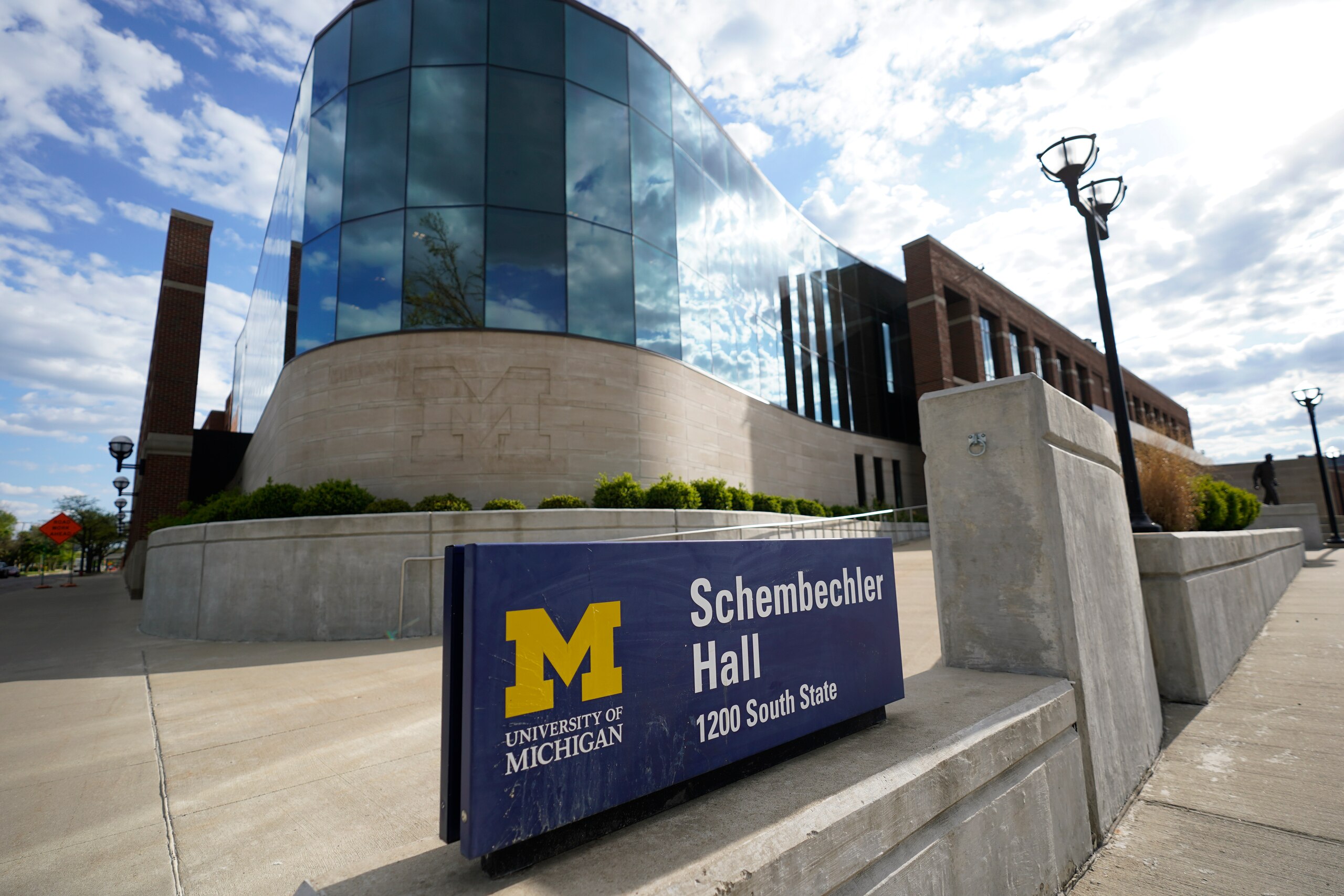 Schembechler Hall on the University of Michigan Campus in Ann Arbor, Mich., is shown May 14, 2021. The building is named after legendary football coach Bo Shembechler. A report released Tuesday, May 11, 2021, about the stunning lack of action at the University of Michigan while a rogue doctor, Robert Anderson, was sexually assaulting hundreds of young men has pointed an unflattering light at one of the school's giants, the late football coach Bo Schembechler, whose bronze statue stands on campus. (AP Photo/Paul Sancya)
