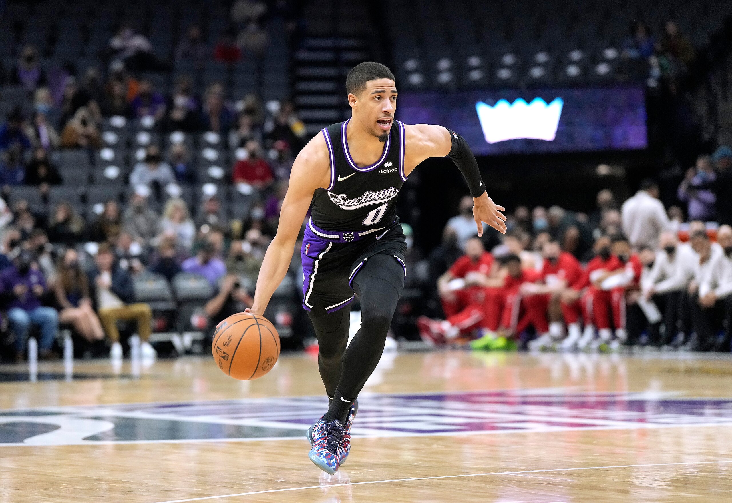SACRAMENTO, CALIFORNIA - JANUARY 14: Tyrese Haliburton #0 of the Sacramento Kings dribbling the ball up court against the Houston Rockets during the first quarter at Golden 1 Center on January 14, 2022 in Sacramento, California. NOTE TO USER: User expressly acknowledges and agrees that, by downloading and/or using this photograph, User is consenting to the terms and conditions of the Getty Images License Agreement. (Photo by Thearon W. Henderson/Getty Images)