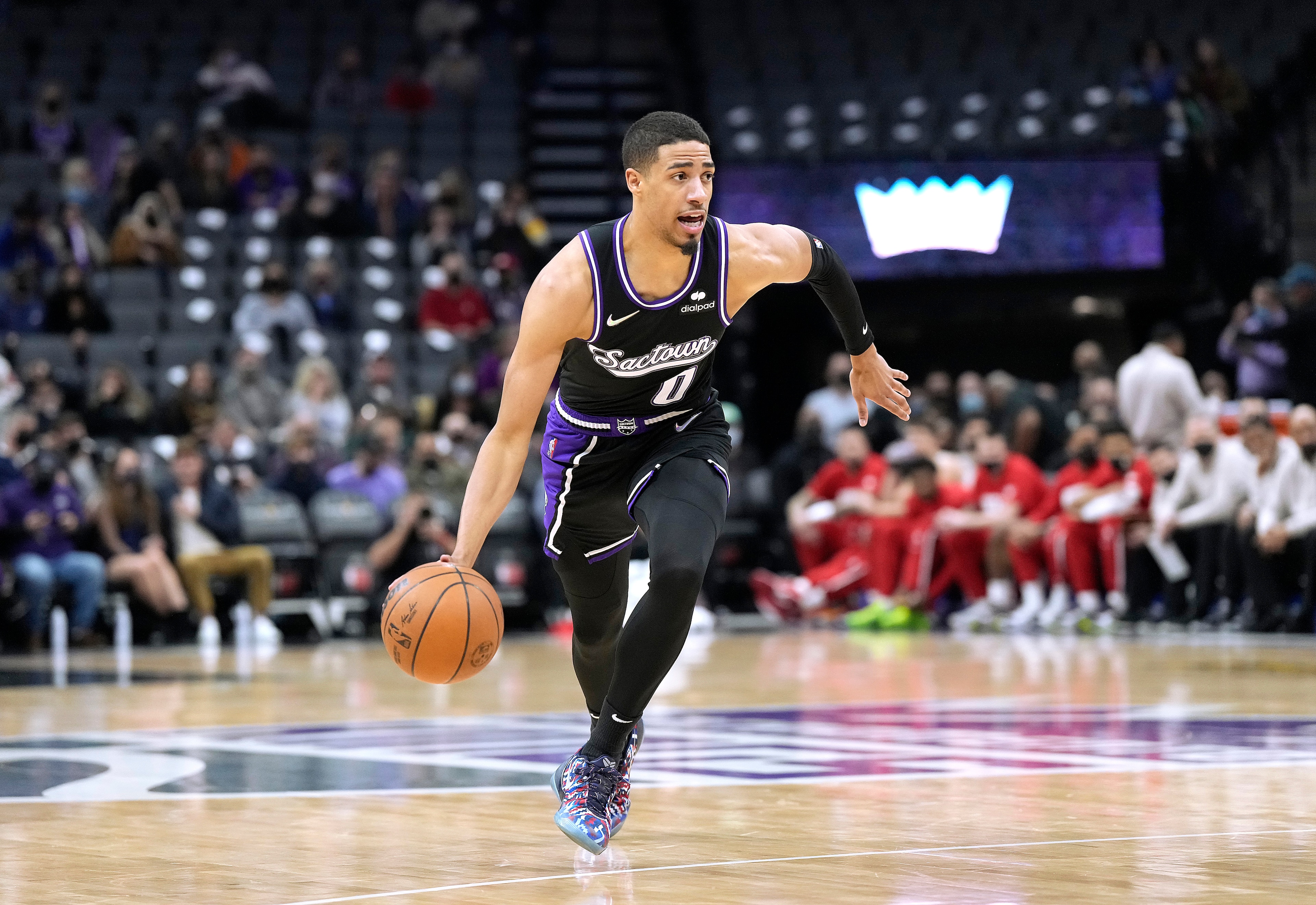 SACRAMENTO, CALIFORNIA - JANUARY 14: Tyrese Haliburton #0 of the Sacramento Kings dribbling the ball up court against the Houston Rockets during the first quarter at Golden 1 Center on January 14, 2022 in Sacramento, California. NOTE TO USER: User expressly acknowledges and agrees that, by downloading and/or using this photograph, User is consenting to the terms and conditions of the Getty Images License Agreement. (Photo by Thearon W. Henderson/Getty Images)