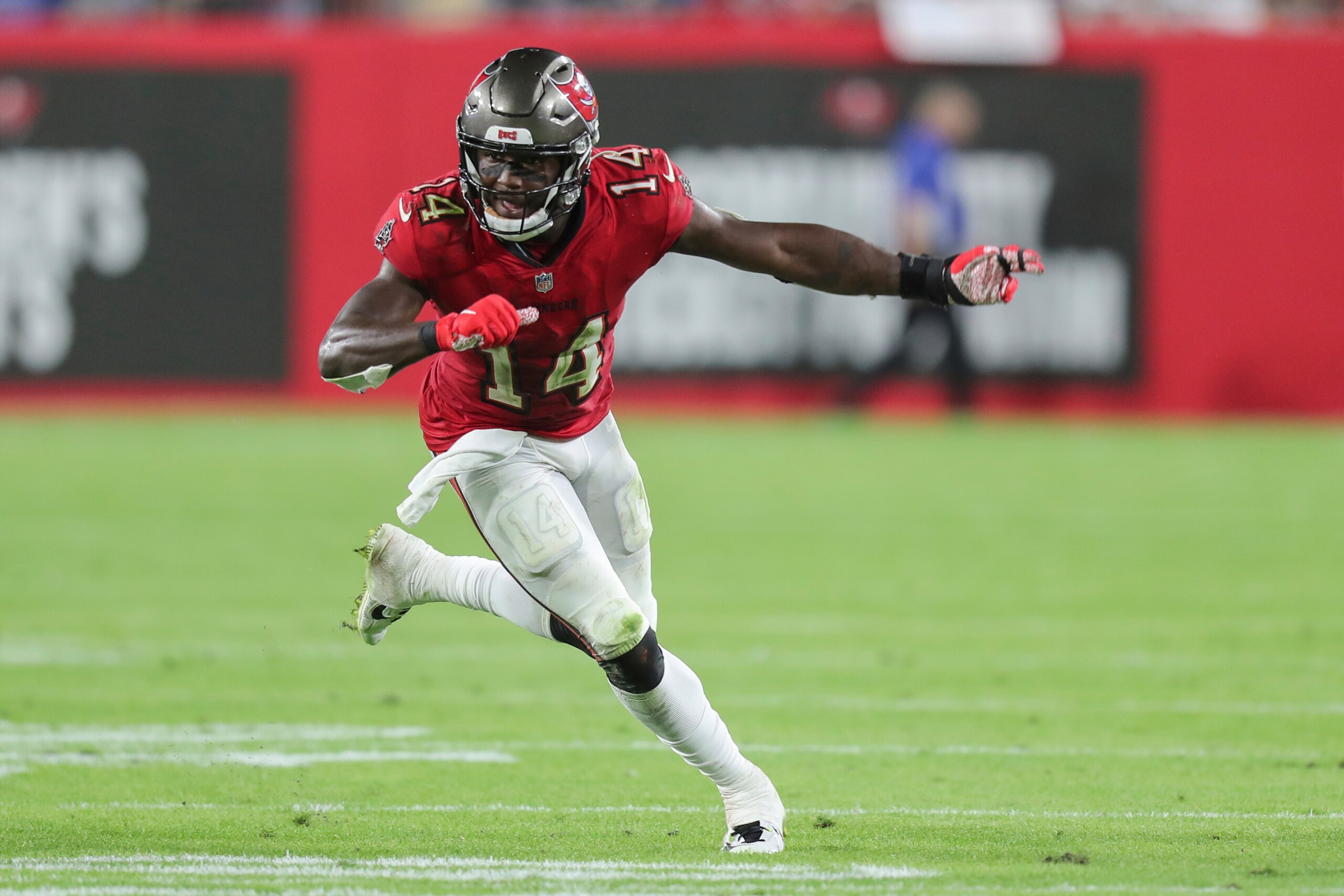 Tampa Bay Buccaneers wide receiver Chris Godwin (14) runs his route during a NFL football game against the Buffalo Bills, Sunday, Dec.12, 2021 in Tampa, Fla. (AP Photo/Alex Menendez)