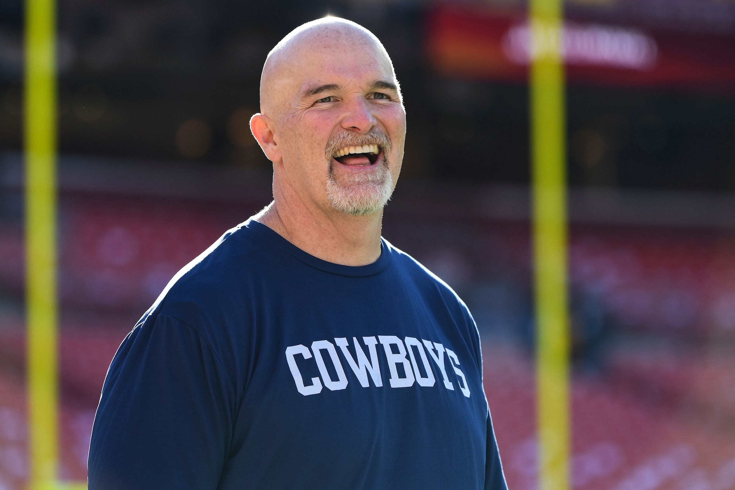 Dallas Cowboys defensive coordinator Dan Quinn looks on during pre-game warm-ups before an NFL football game against the Washington Football Team, Sunday, Dec. 12, 2021, in Landover, Md. (AP Photo/Terrance Williams)
