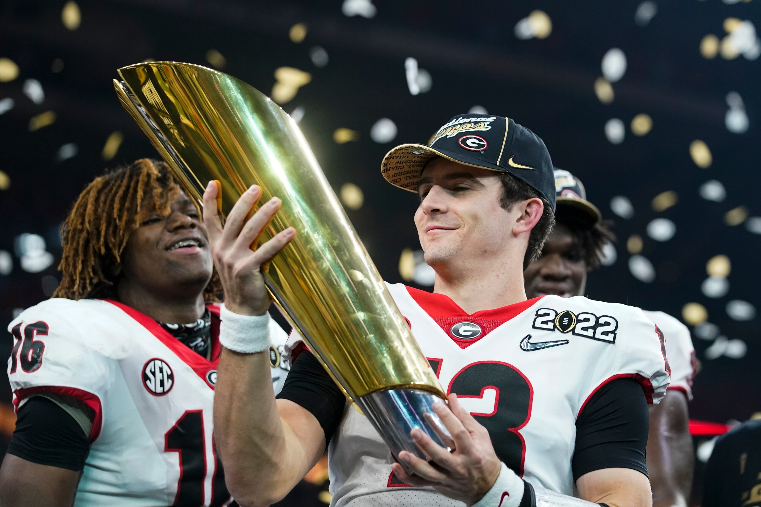 Georgia's Stetson Bennett celebrates after the College Football Playoff championship football game against Alabama Tuesday, Jan. 11, 2022, in Indianapolis. Georgia won 33-18. (AP Photo/Darron Cummings)