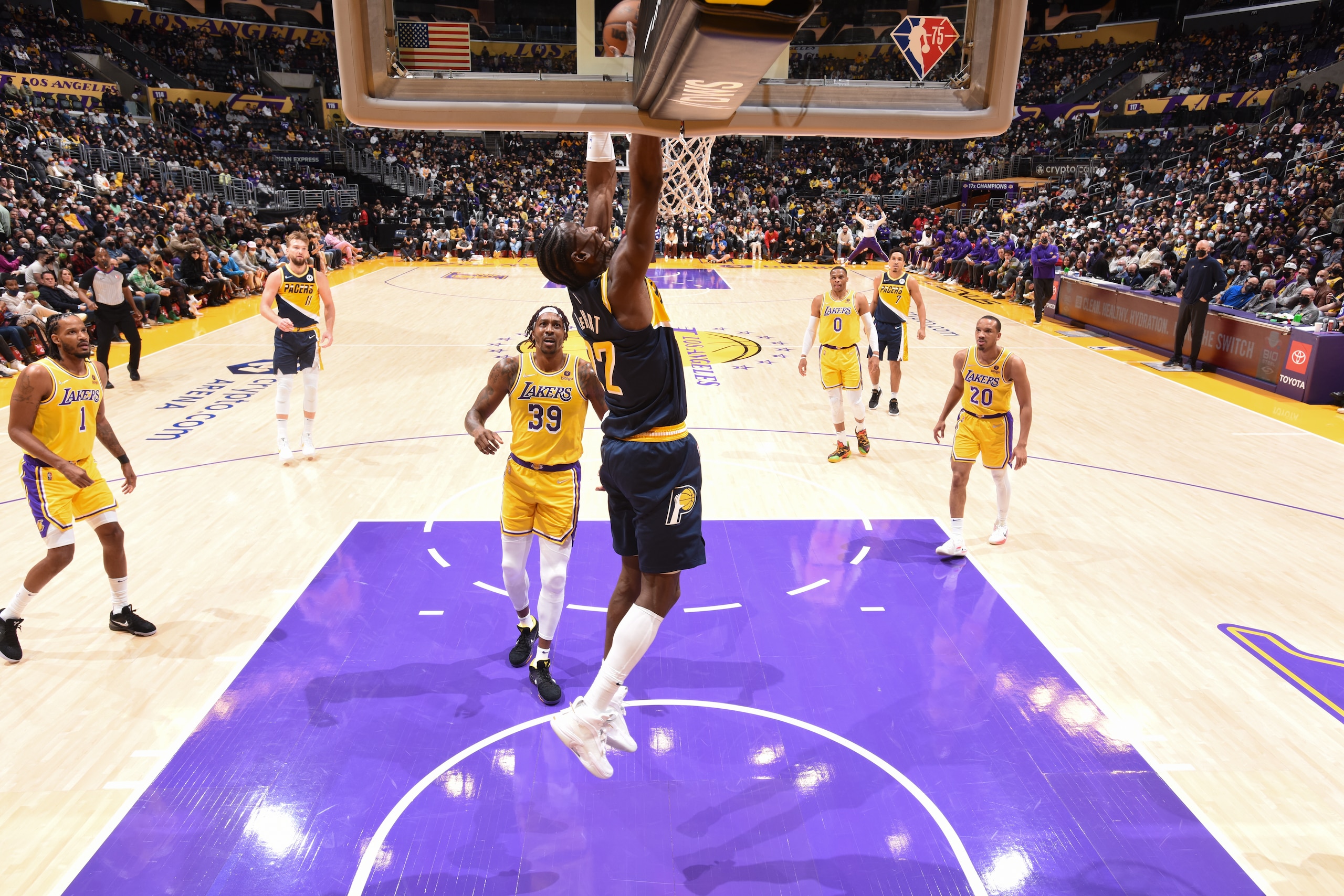 LOS ANGELES, CA - JANUARY 19: Caris LeVert #22 of the Indiana Pacers dunks the ball during the game against the Los Angeles Lakers on January 19, 2022 at Crypto.Com Arena in Los Angeles, California. NOTE TO USER: User expressly acknowledges and agrees that, by downloading and/or using this Photograph, user is consenting to the terms and conditions of the Getty Images License Agreement. Mandatory Copyright Notice: Copyright 2022 NBAE (Photo by Adam Pantozzi/NBAE via Getty Images)