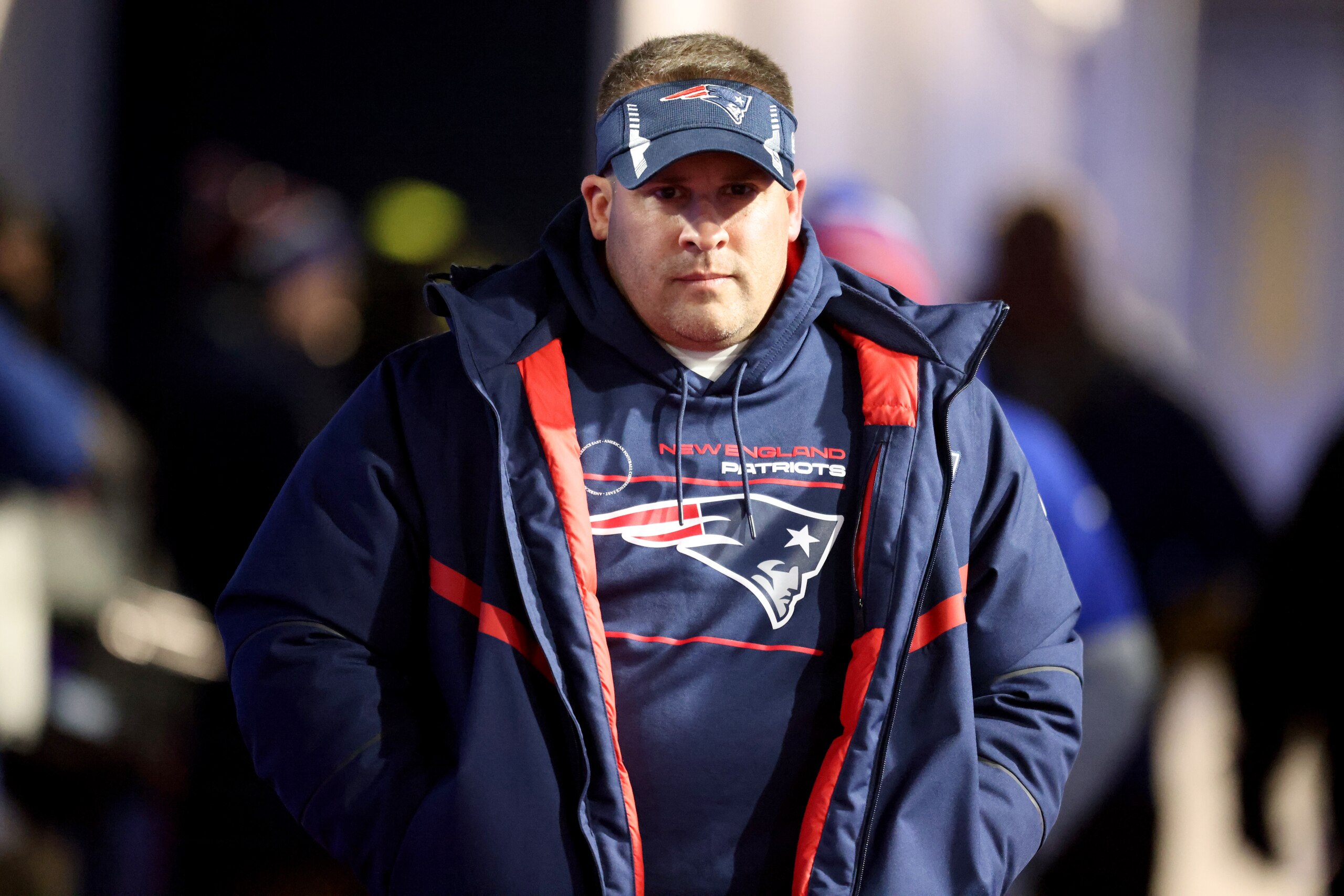 ORCHARD PARK, NEW YORK - DECEMBER 06: Offensive Coordinator and Quarterbacks Coach Josh McDaniels of the New England Patriots walks to the field prior to a game against the Buffalo Bills at Highmark Stadium on December 06, 2021 in Orchard Park, New York. (Photo by Bryan M. Bennett/Getty Images)