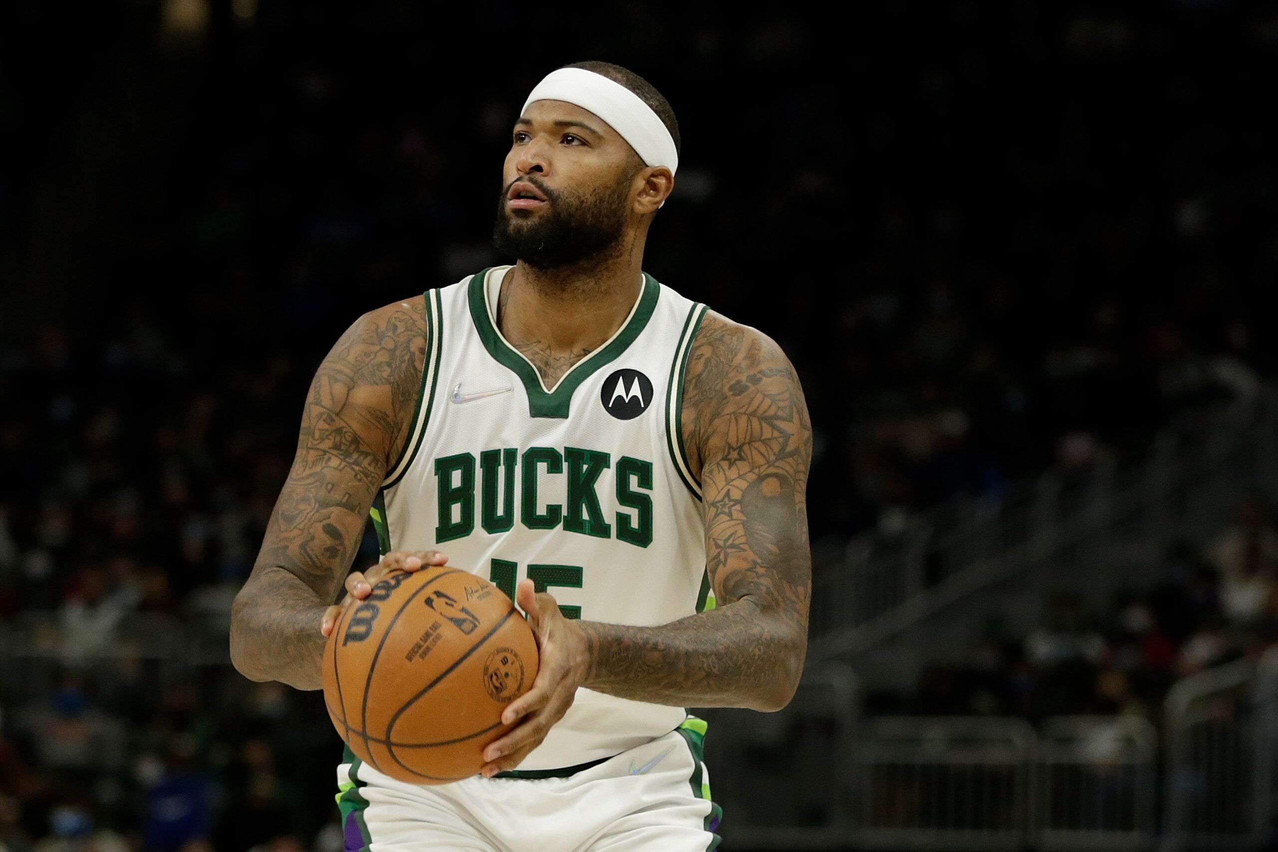 MILWAUKEE, WISCONSIN - JANUARY 05: DeMarcus Cousins #15 of the Milwaukee Bucks shoots a jump shot during the first half of the game against the Toronto Raptors at Fiserv Forum on January 05, 2022 in Milwaukee, Wisconsin. Raptors defeated the Bucks 117-111. NOTE TO USER: User expressly acknowledges and agrees that, by downloading and or using this photograph, User is consenting to the terms and conditions of the Getty Images License Agreement. (Photo by John Fisher/Getty Images)