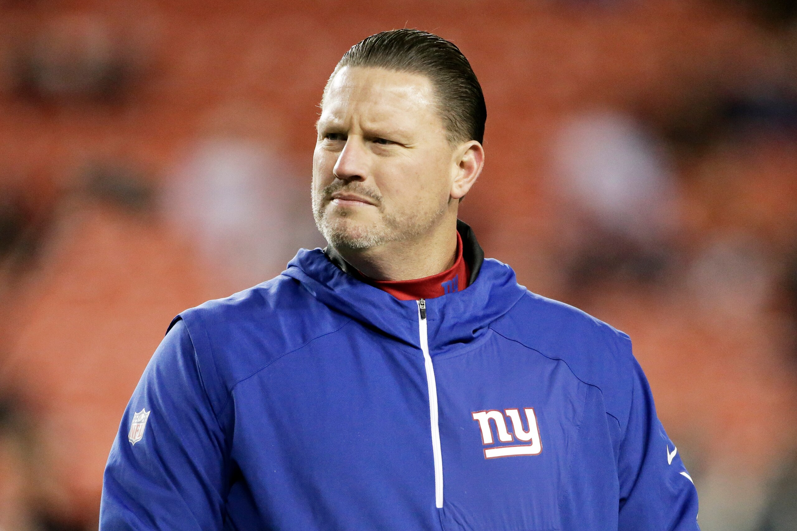 FILE - In this Nov. 23, 2017, file photo, New York Giants coach Ben McAdoo stands on the field before the team's NFL football game against the Washington Redskins in Landover, Md. The Jacksonville Jaguars have hired former New York Giants head coach Ben McAdoo as quarterbacks coach. McAdoo replaces Scott Milanovich, who left at the end of last season to take the head coaching job with the CFLâ€™s Edmonton Eskimos. (AP Photo/Mark Tenally, File)