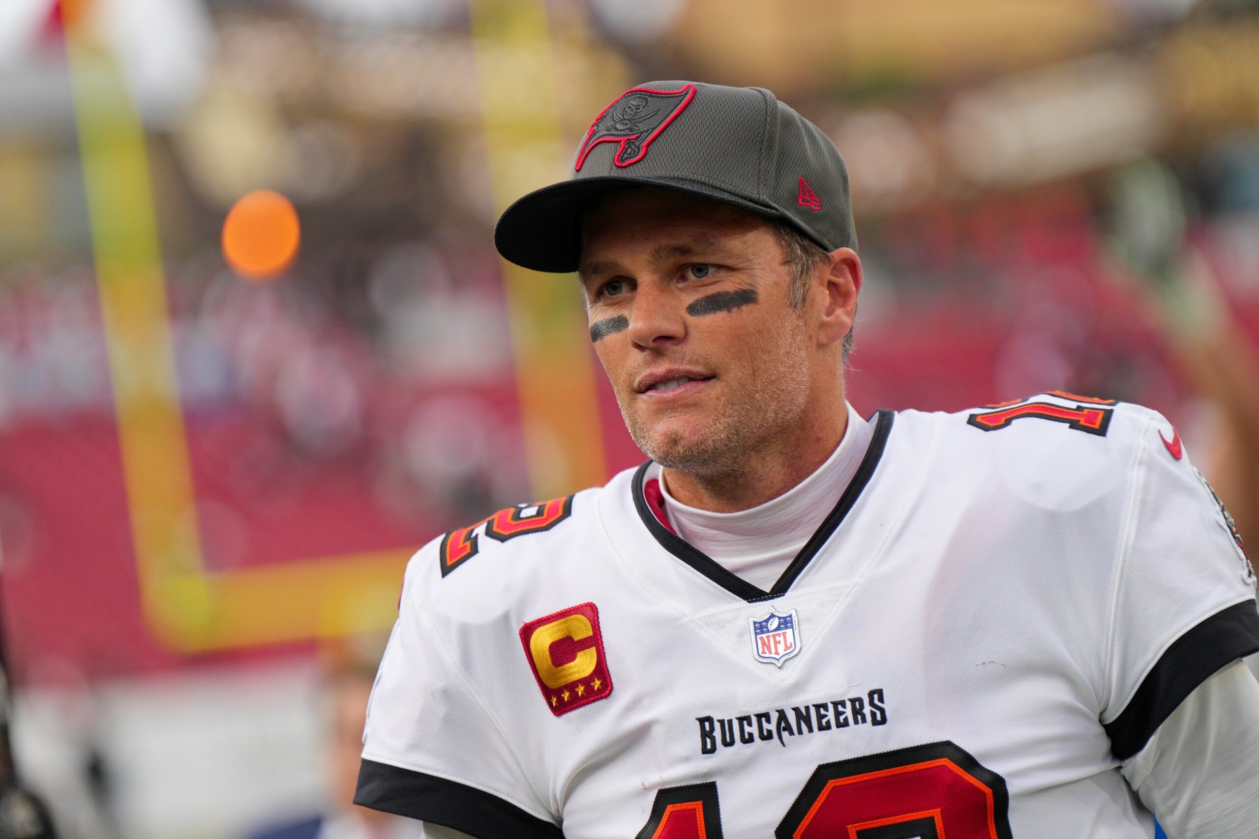 TAMPA, FL - JANUARY 16: Tampa Bay Buccaneers quarterback Tom Brady (12) looks on during the game between the Philadelphia Eagles and the Tampa Bay Buccaneers on January 16, 2022 at  Raymond James Stadium in Tampa, FL. (Photo by Andy Lewis/Icon Sportswire via Getty Images)