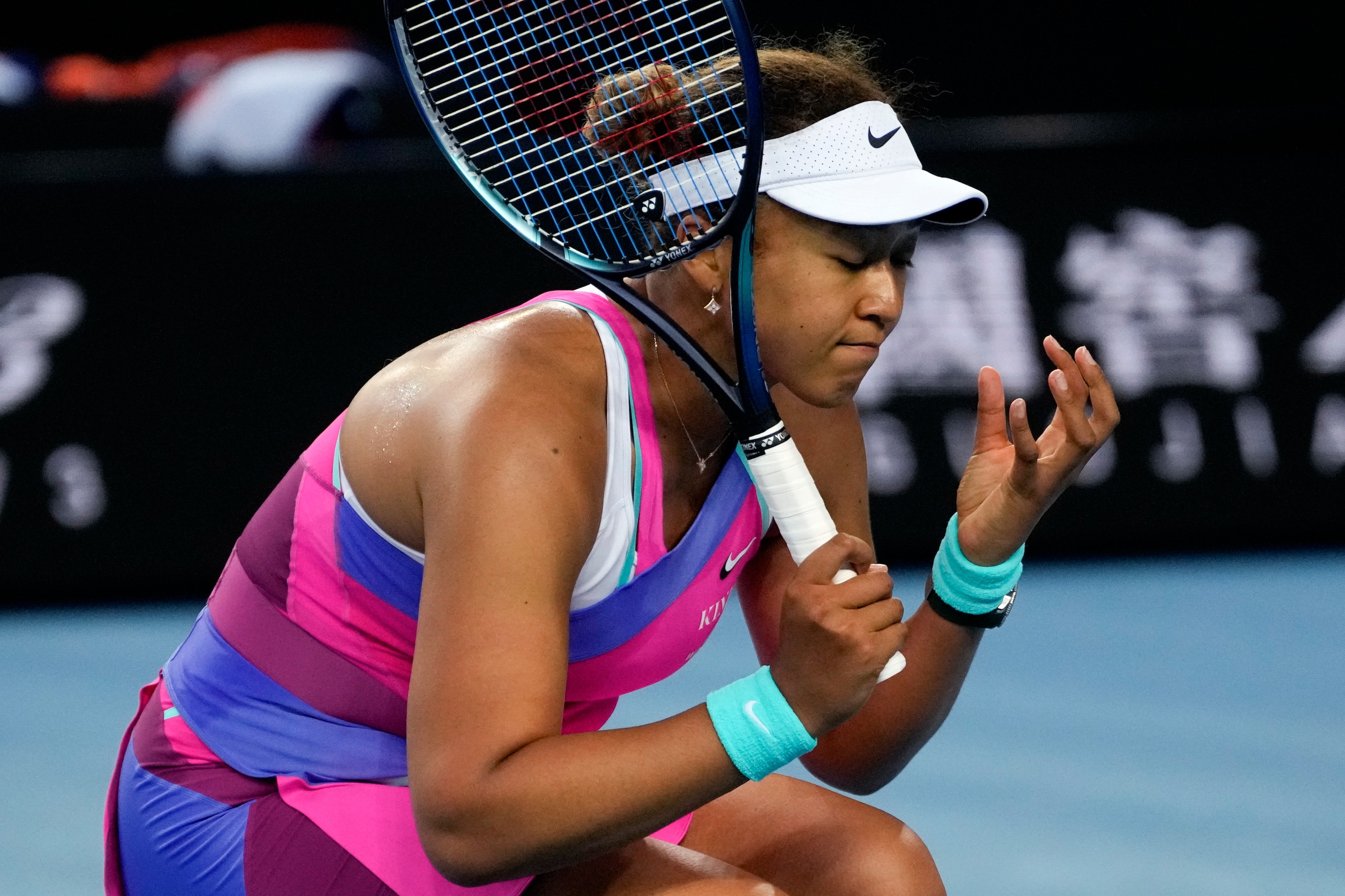 Naomi Osaka of Japan reacts during her third round match against Amanda Anisimova of the U.S. at the Australian Open tennis championships in Melbourne, Australia, Friday, Jan. 21, 2022. (AP Photo/Simon Baker) Naomi Osaka of Japan reacts during her third round match against Amanda Anisimova of the U.S. at the Australian Open tennis championships in Melbourne, Australia, Friday, Jan. 21, 2022. (AP Photo/Simon Baker)