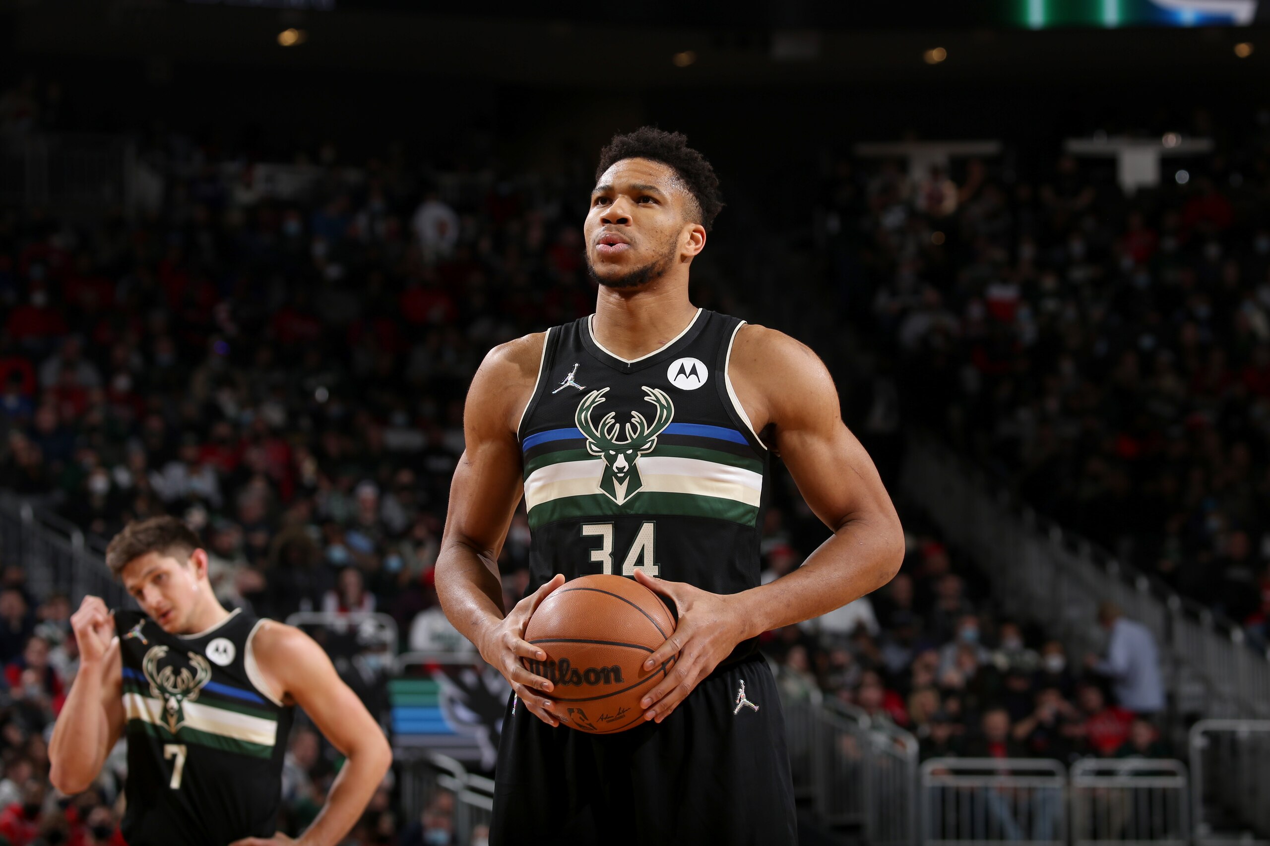 MILWAUKEE, WI - JANUARY 21: Giannis Antetokounmpo #34 of the Milwaukee Bucks shoots a free throw during the game against the Chicago Bulls on January 21, 2022 at the Fiserv Forum Center in Milwaukee, Wisconsin. NOTE TO USER: User expressly acknowledges and agrees that, by downloading and or using this Photograph, user is consenting to the terms and conditions of the Getty Images License Agreement. Mandatory Copyright Notice: Copyright 2022 NBAE (Photo by Gary Dineen/NBAE via Getty Images).