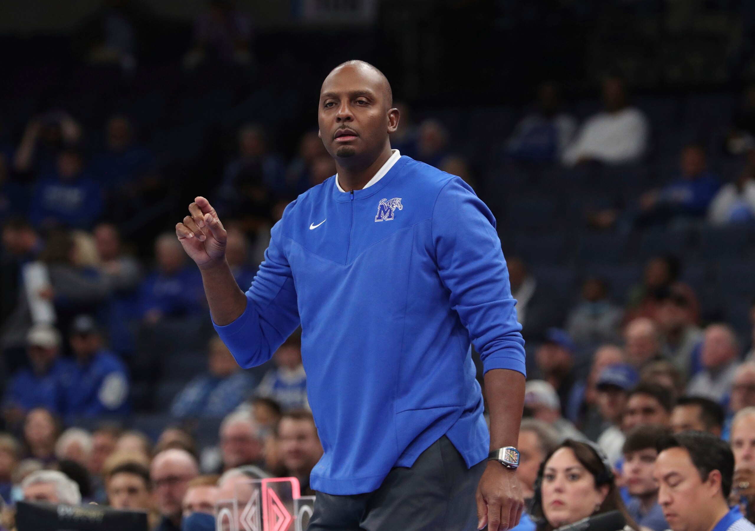 Memphis coach Penny Hardaway calls to his players during the first half of an NCAA college basketball game against Tennessee Tech, Tuesday, Nov. 9, 2021, in Memphis, Tenn. (AP Photo/Karen Pulfer Focht)
