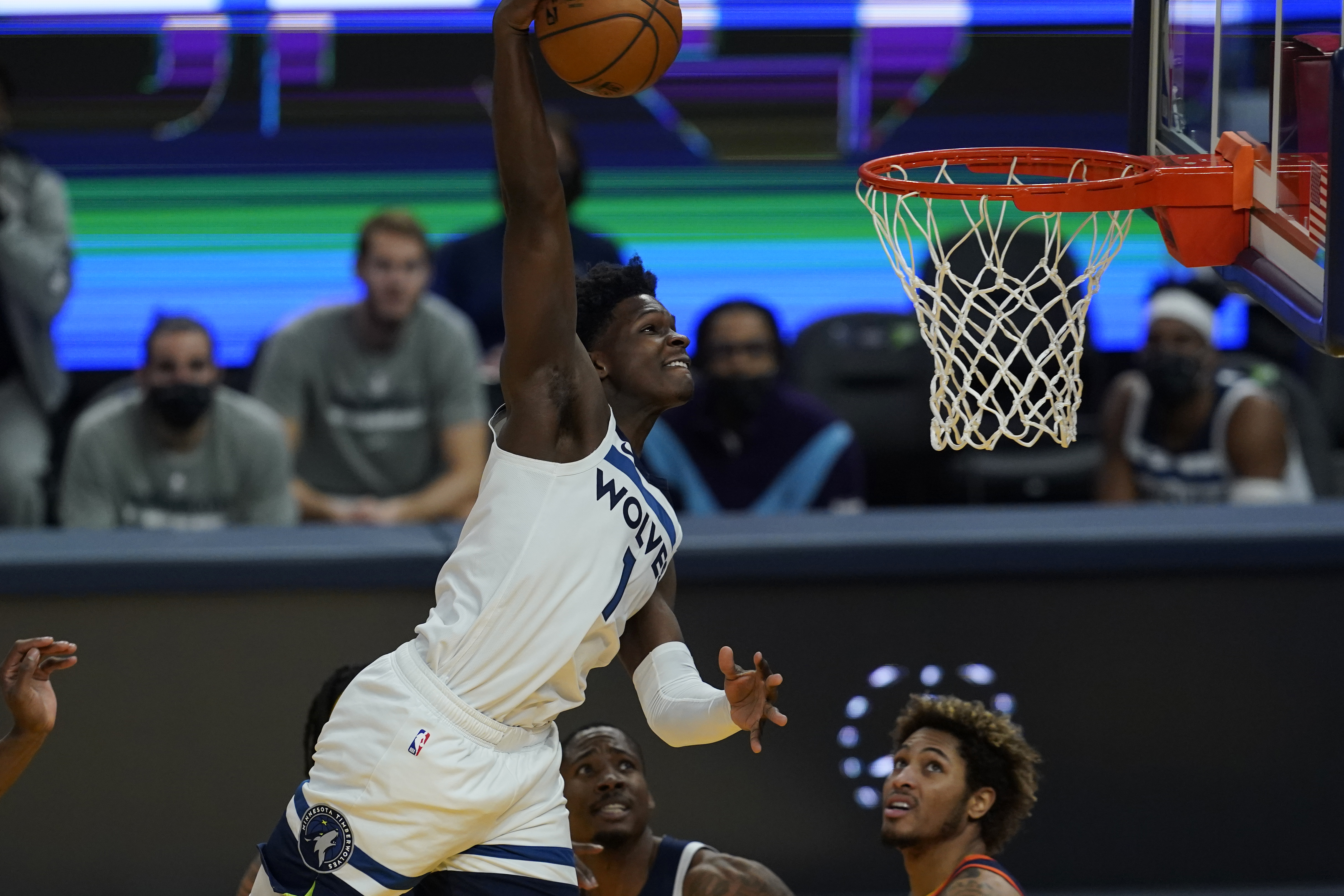 Minnesota Timberwolves guard Anthony Edwards dunks against the Golden State Warriors during an NBA basketball game in San Francisco, Monday, Jan. 25, 2021. (AP Photo/Jeff Chiu)
