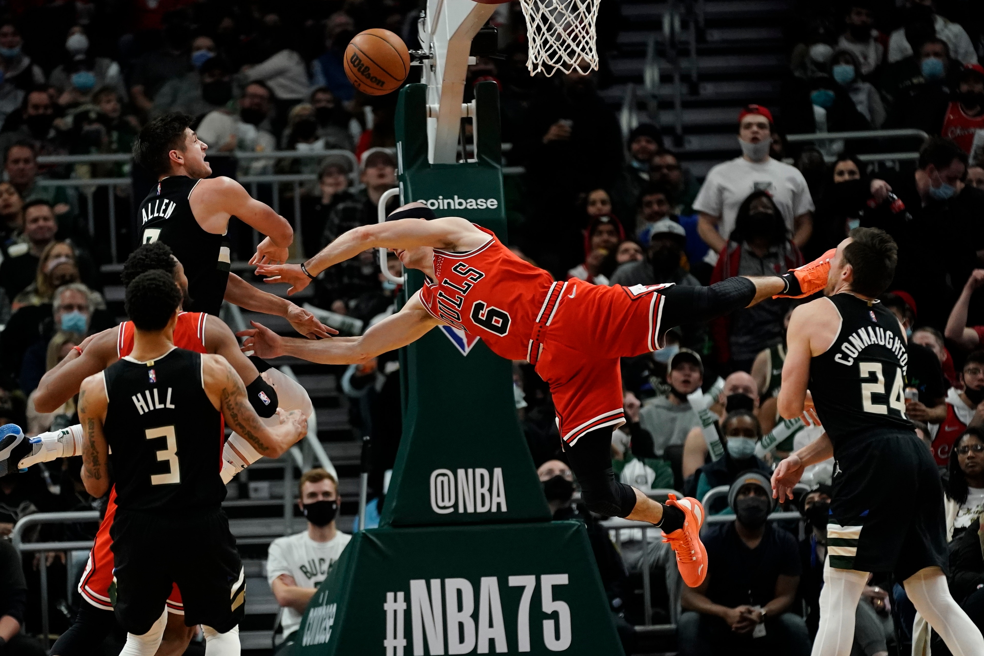 Milwaukee Bucks' Grayson Allen fouls Chicago Bulls' Alex Caruso during the second half of an NBA basketball game Friday, Jan. 21, 2022, in Milwaukee. The Bucks won 94-90. (AP Photo/Morry Gash) Milwaukee Bucks' Grayson Allen fouls Chicago Bulls' Alex Caruso during the second half of an NBA basketball game Friday, Jan. 21, 2022, in Milwaukee. The Bucks won 94-90. (AP Photo/Morry Gash)