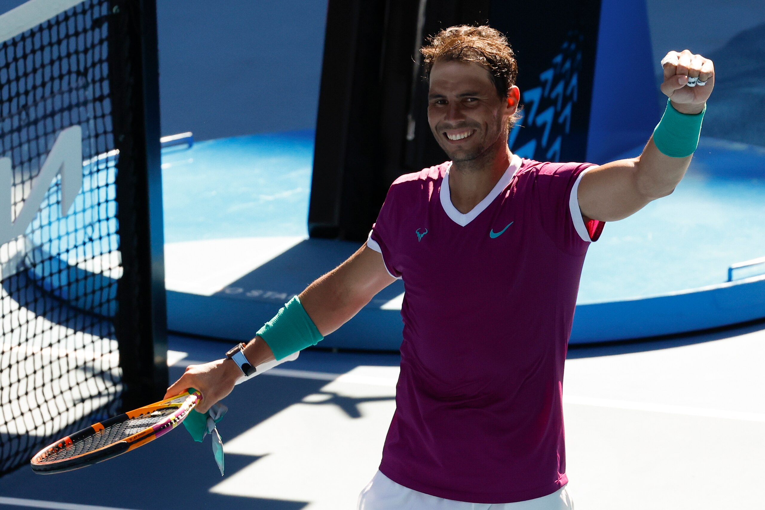 Rafael Nadal of Spain celebrates after defeating Adrian Mannarino of France in their fourth round match at the Australian Open tennis championships in Melbourne, Australia, Sunday, Jan. 23, 2022. (AP Photo/Hamish Blair) Rafael Nadal of Spain celebrates after defeating Adrian Mannarino of France in their fourth round match at the Australian Open tennis championships in Melbourne, Australia, Sunday, Jan. 23, 2022. (AP Photo/Hamish Blair)