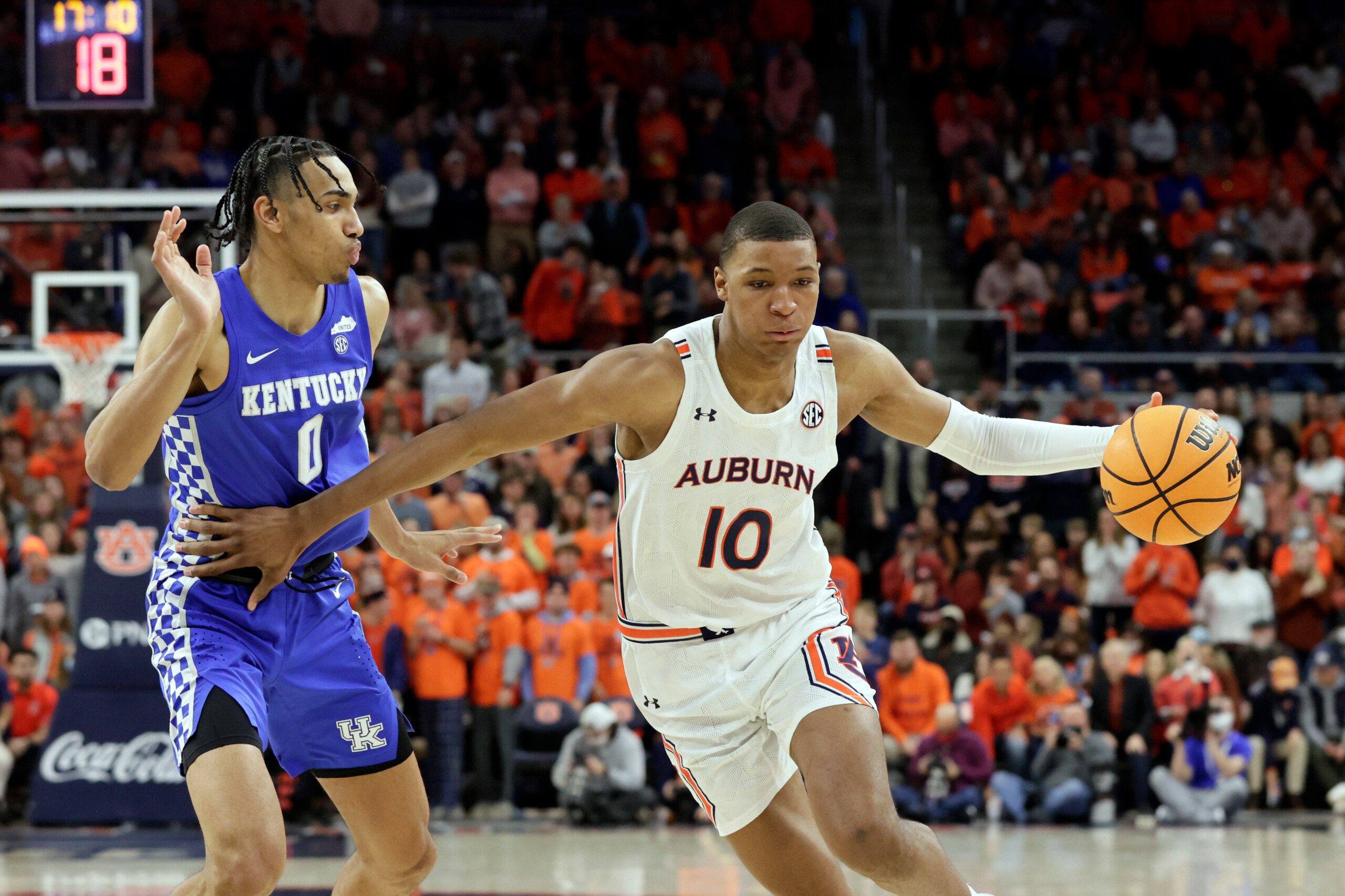 Auburn forward Jabari Smith (10) drives to the basket around Kentucky forward Jacob Toppin (0) during the second half of an NCAA college basketball game Saturday, Jan. 22, 2022, in Auburn, Ala. (AP Photo/Butch Dill) Auburn forward Jabari Smith (10) drives to the basket around Kentucky forward Jacob Toppin (0) during the second half of an NCAA college basketball game Saturday, Jan. 22, 2022, in Auburn, Ala. (AP Photo/Butch Dill)