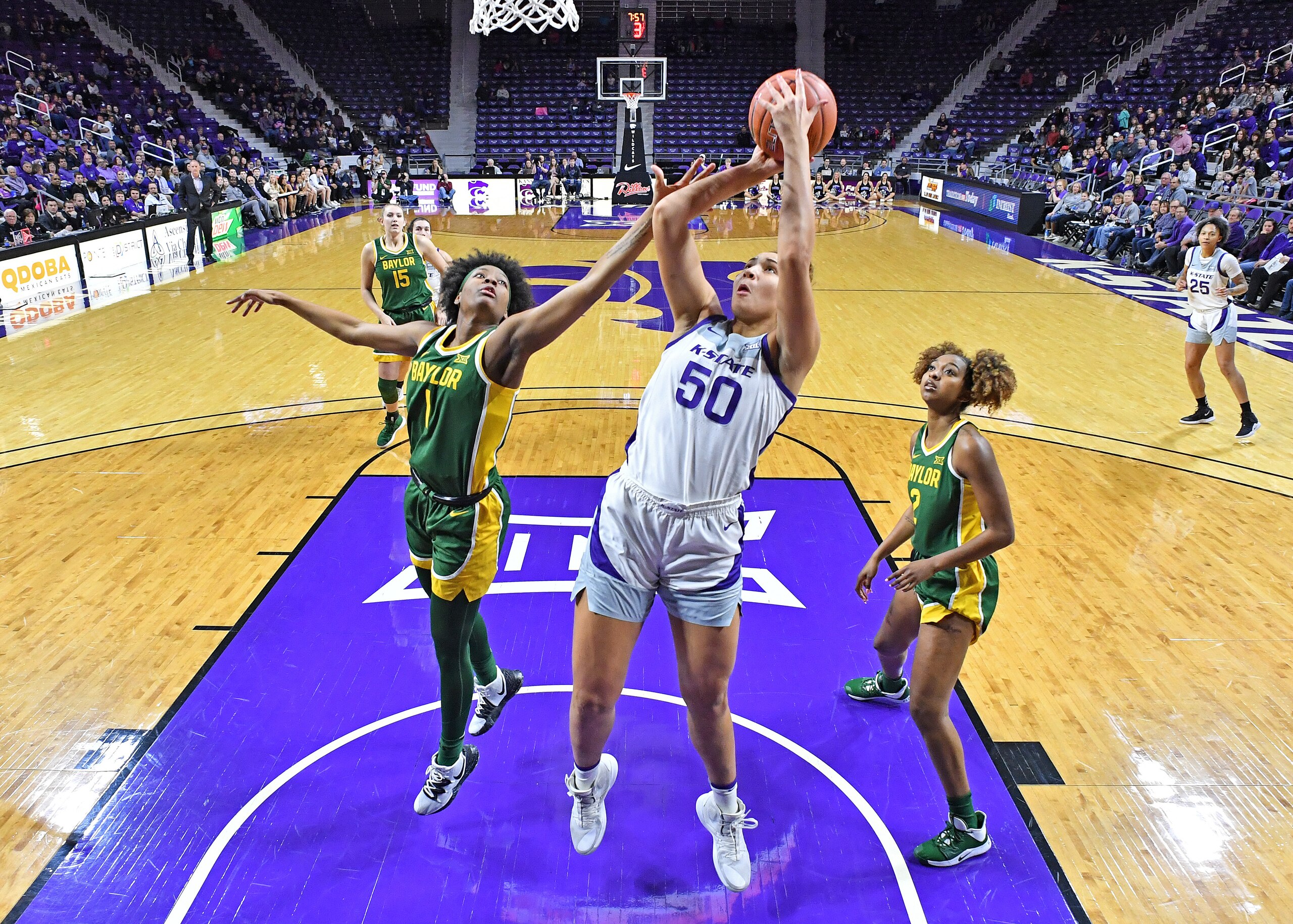 MANHATTAN, KS - FEBRUARY 08:  Ayoka Lee #50 of the Kansas State Wildcats scores a basket against NaLyssa Smith #1 of the Baylor Lady Bears during the first quarter on February 8, 2020 at Bramlage Coliseum in Manhattan, Kansas.  (Photo by Peter G. Aiken/Getty Images)