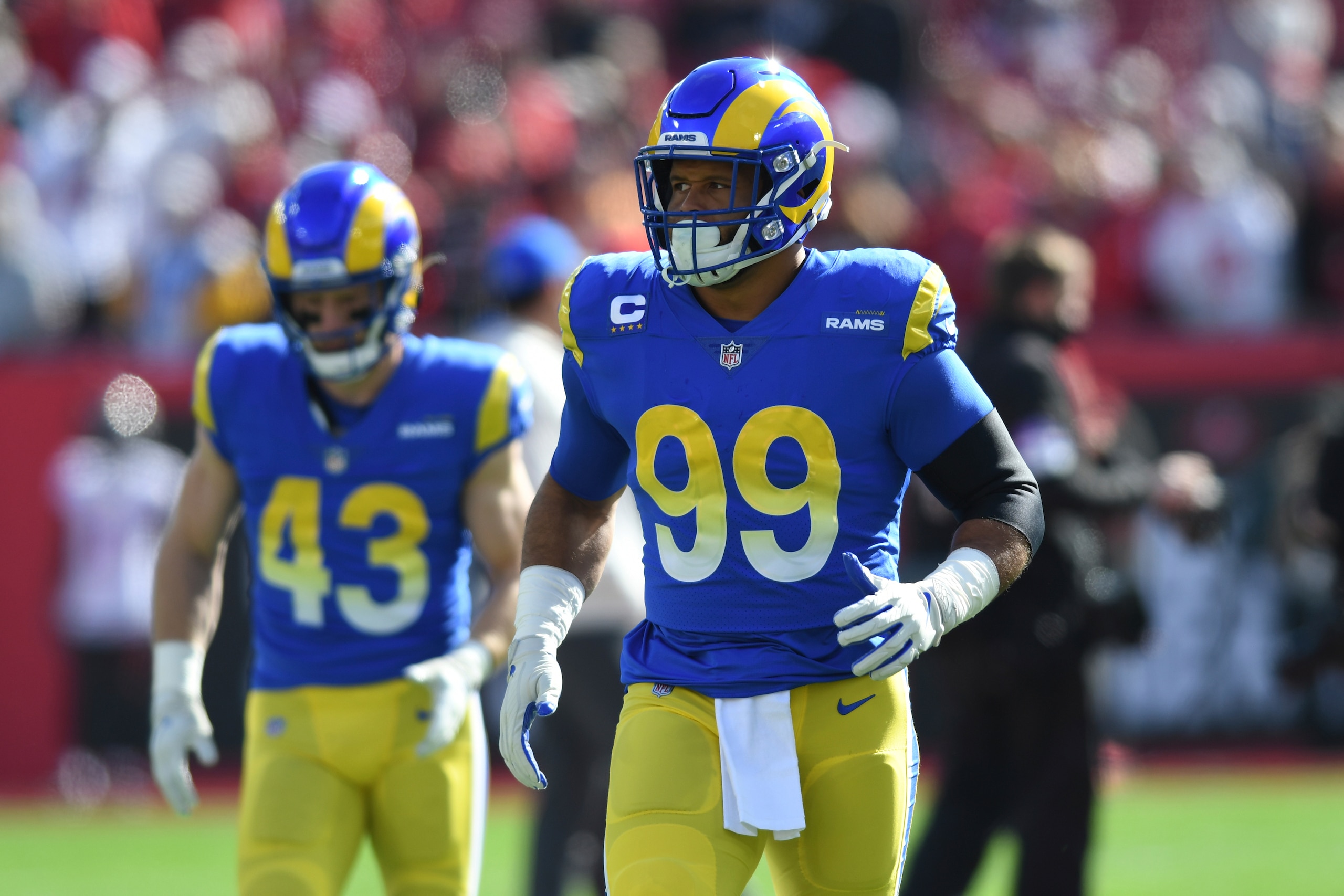 Los Angeles Rams defensive end Aaron Donald (99) before an NFL divisional round playoff football game against the Tampa Bay Buccaneers Sunday, Jan. 23, 2022, in Tampa, Fla. (AP Photo/Jason Behnken) Los Angeles Rams defensive end Aaron Donald (99) before an NFL divisional round playoff football game against the Tampa Bay Buccaneers Sunday, Jan. 23, 2022, in Tampa, Fla. (AP Photo/Jason Behnken)